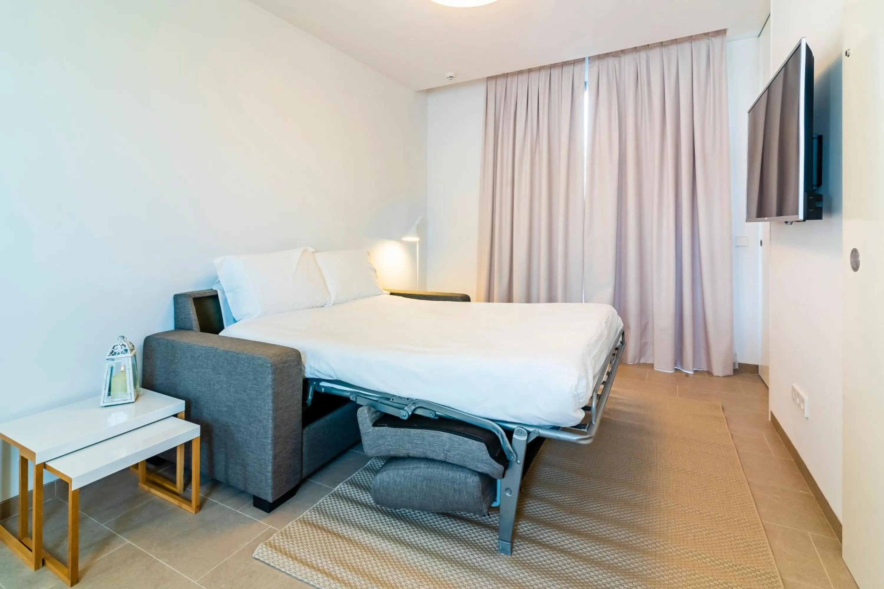 Photo of the whole room, Bed in Tandem Torre de la Calahorra