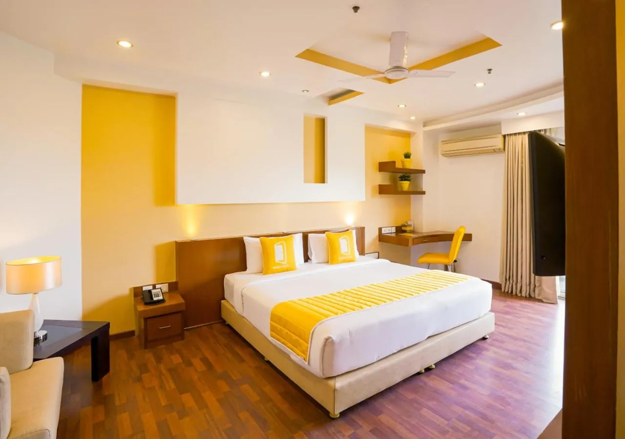 Photo of the whole room, Bed in BloomSuites I Electronics City