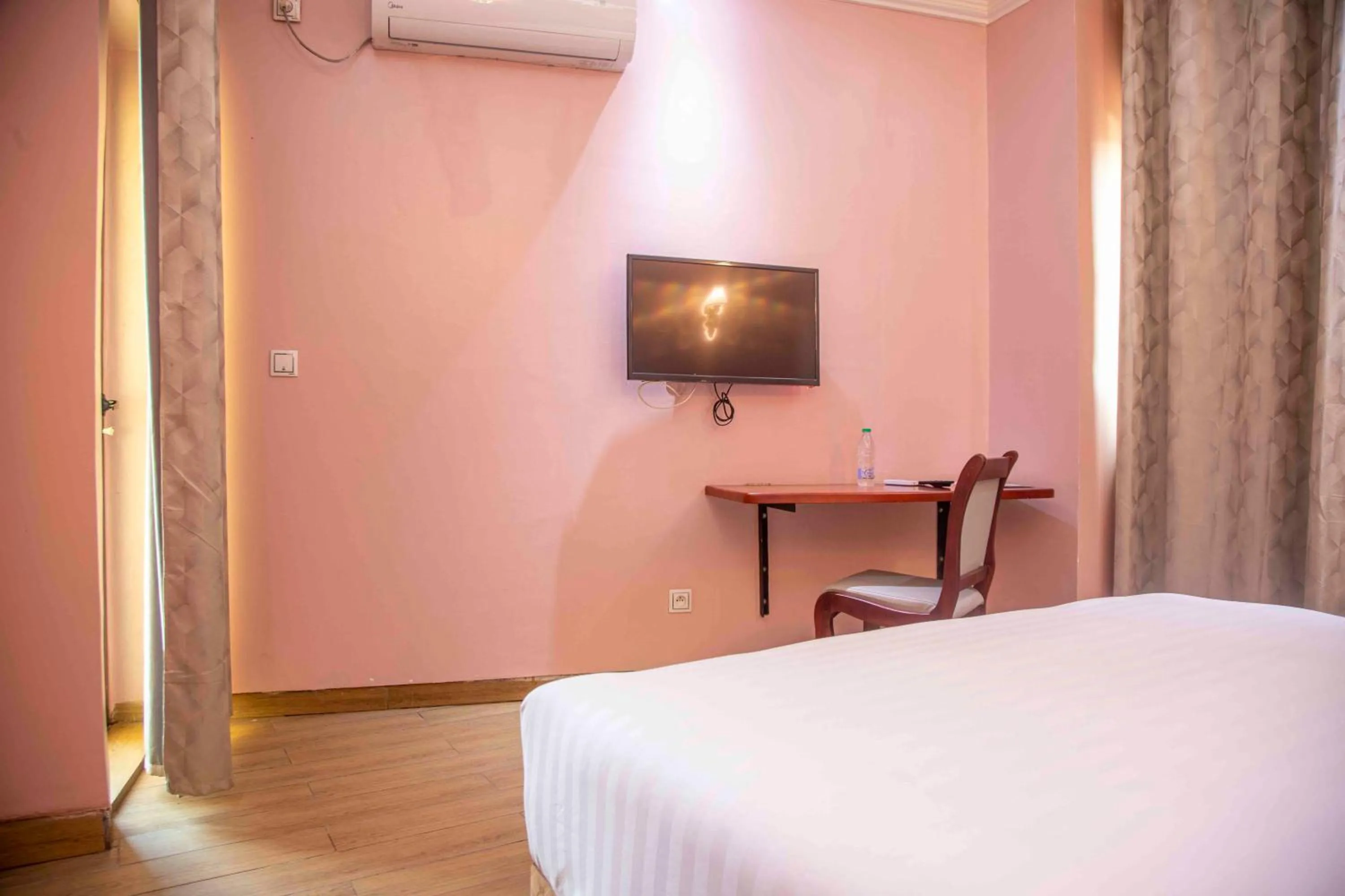 Bed in Hôtel Sindz Palace