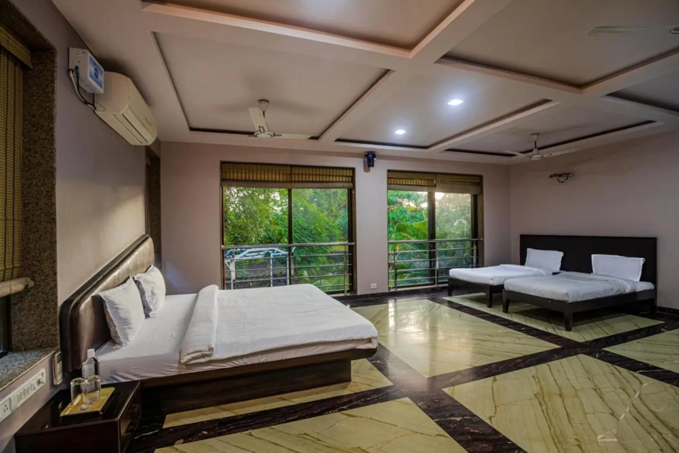 Bed in SaffronStays Aura - 4BR luxury pool villa with gym, BBQ deck, lawns & indoor games near Kihim Beach