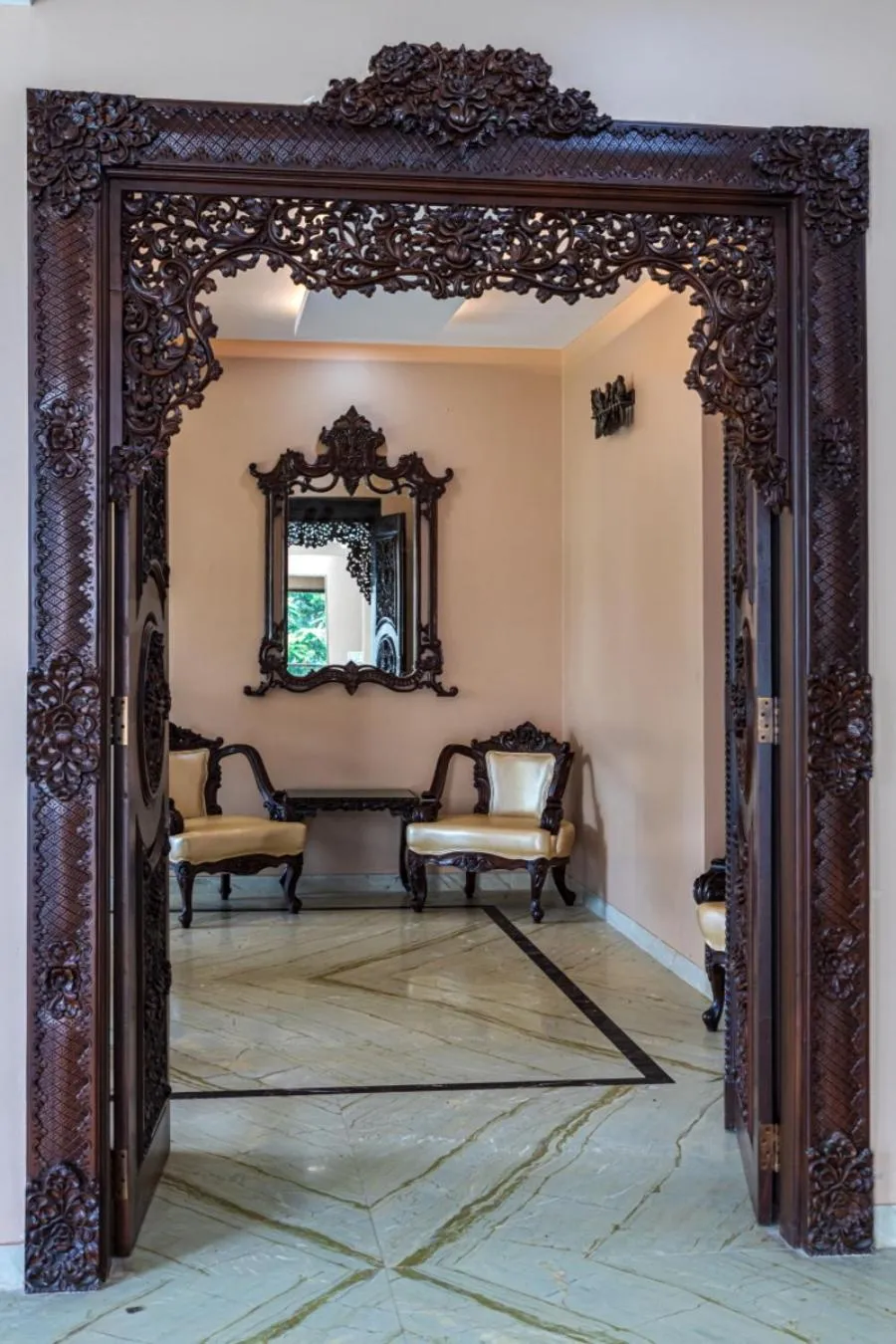 Facade/entrance in SaffronStays Aura - 4BR luxury pool villa with gym, BBQ deck, lawns & indoor games near Kihim Beach