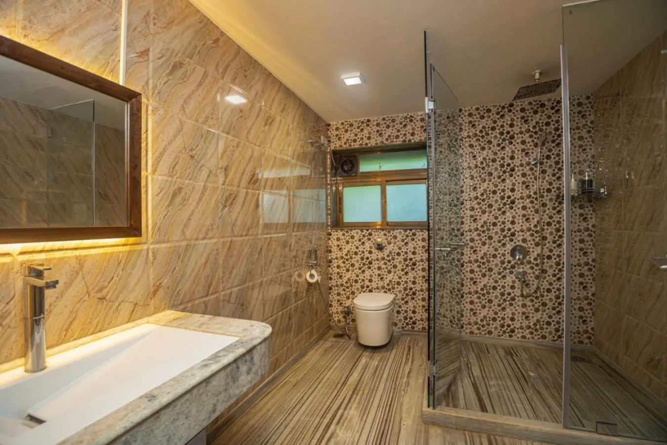 Shower in SaffronStays Aura - 4BR luxury pool villa with gym, BBQ deck, lawns & indoor games near Kihim Beach