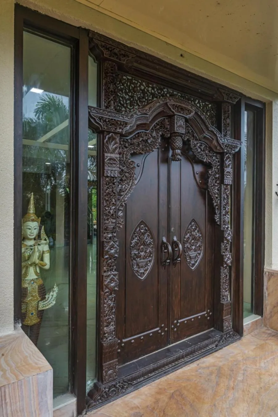 Facade/entrance in SaffronStays Aura - 4BR luxury pool villa with gym, BBQ deck, lawns & indoor games near Kihim Beach