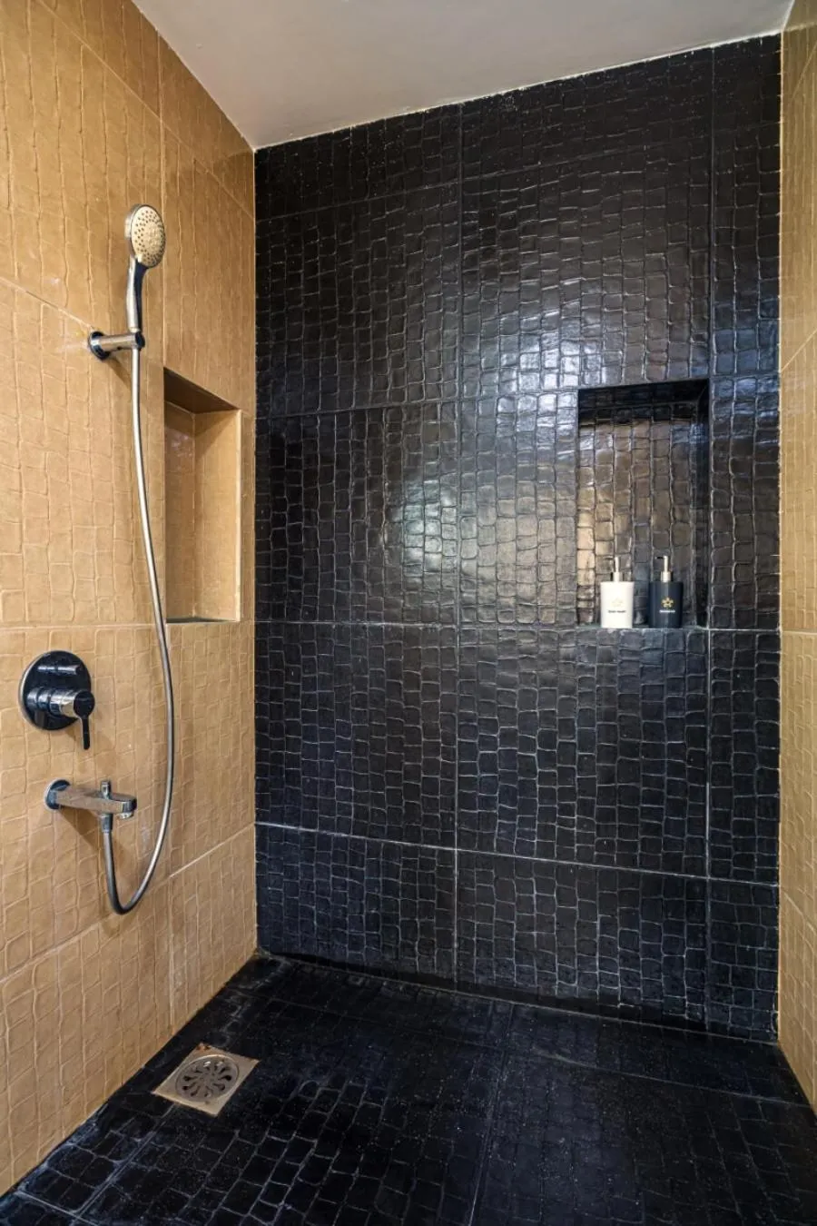 Shower in SaffronStays Aura - 4BR luxury pool villa with gym, BBQ deck, lawns & indoor games near Kihim Beach