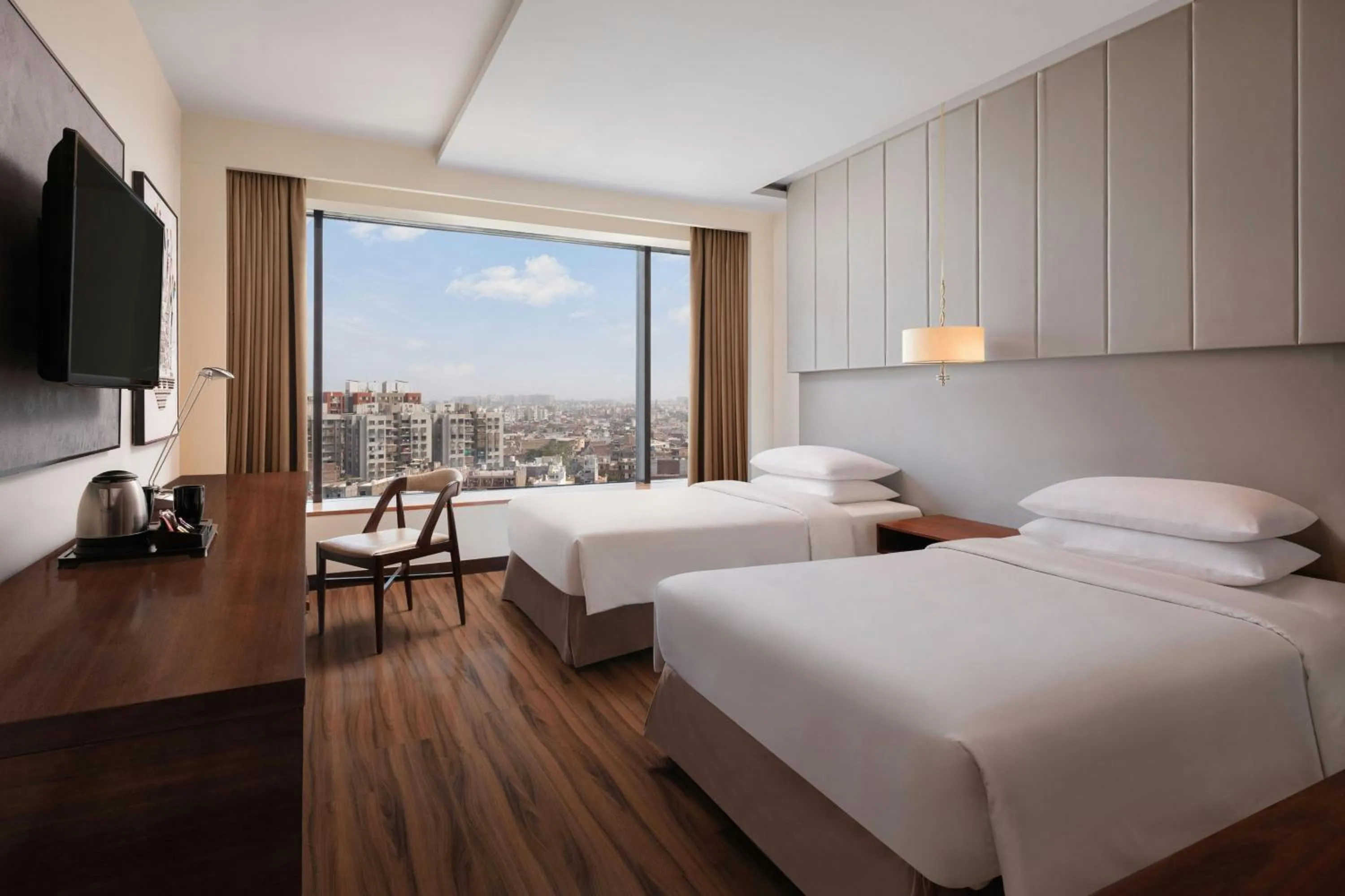 Photo of the whole room, Bed in Renaissance Ahmedabad Hotel