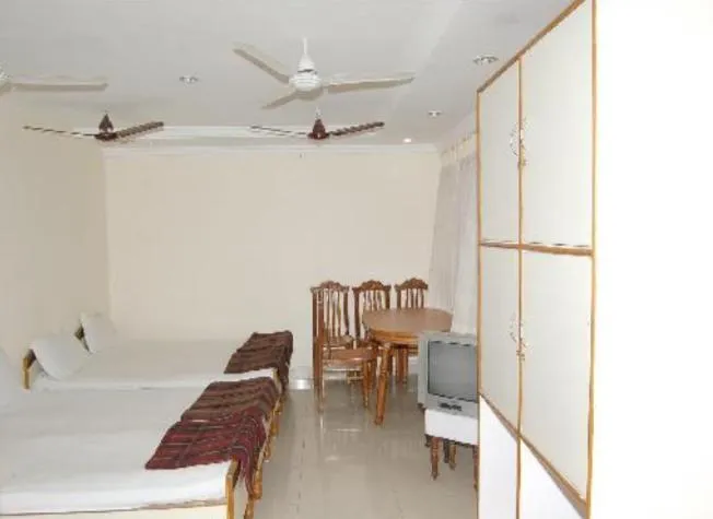 Bed in Hotel Maya Deluxe