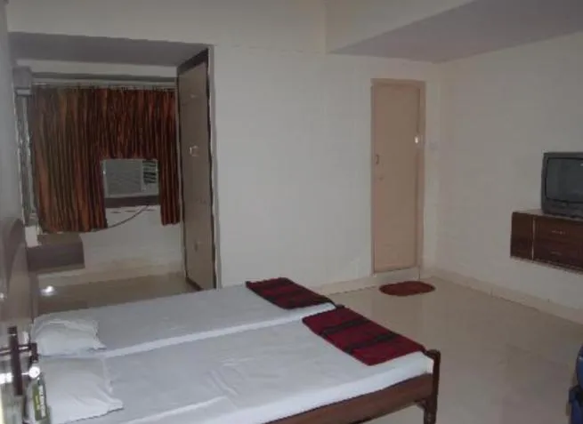 Bed in Hotel Maya Deluxe