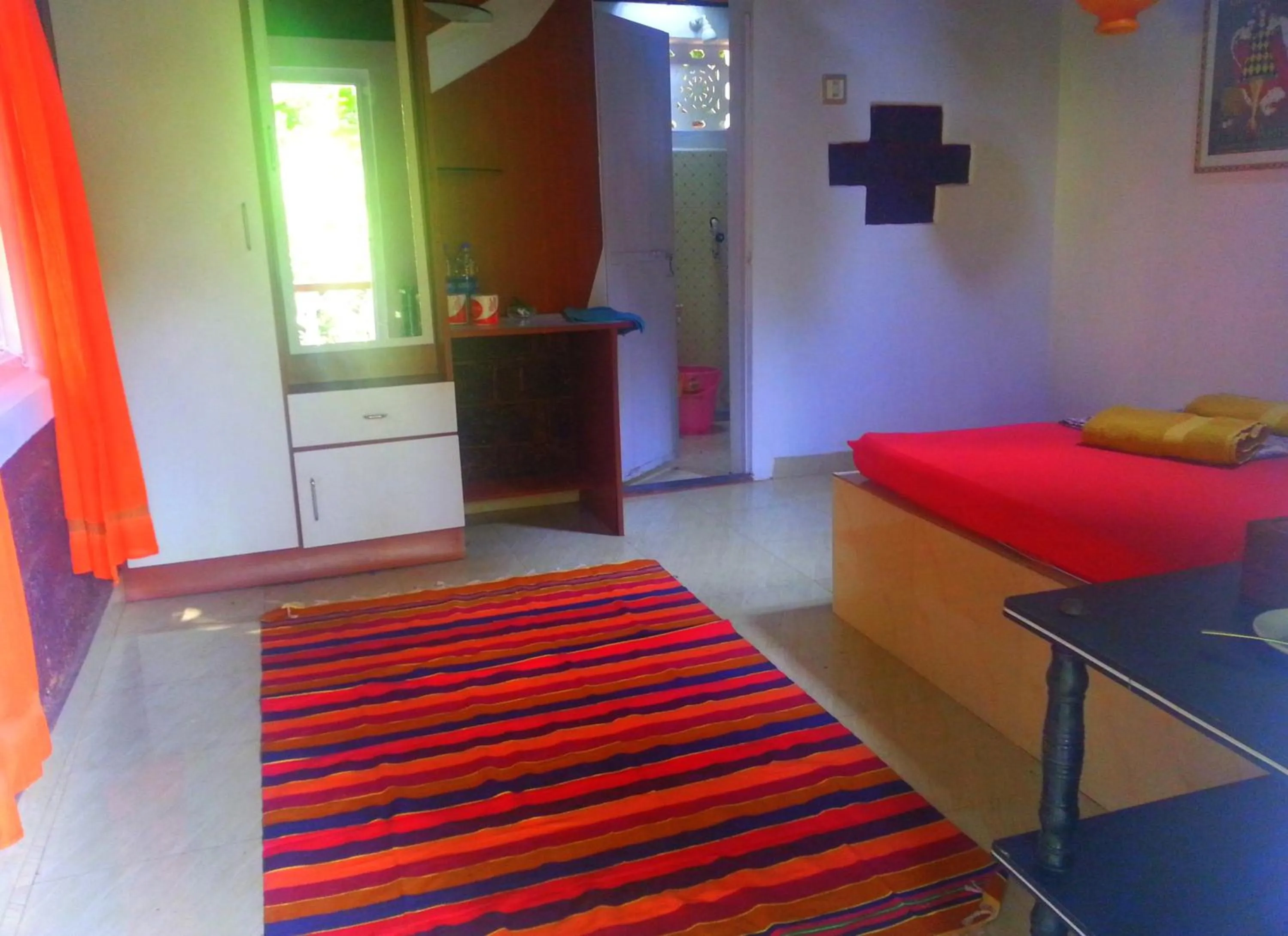 Photo of the whole room, Bed in Namaste Yoga Farm