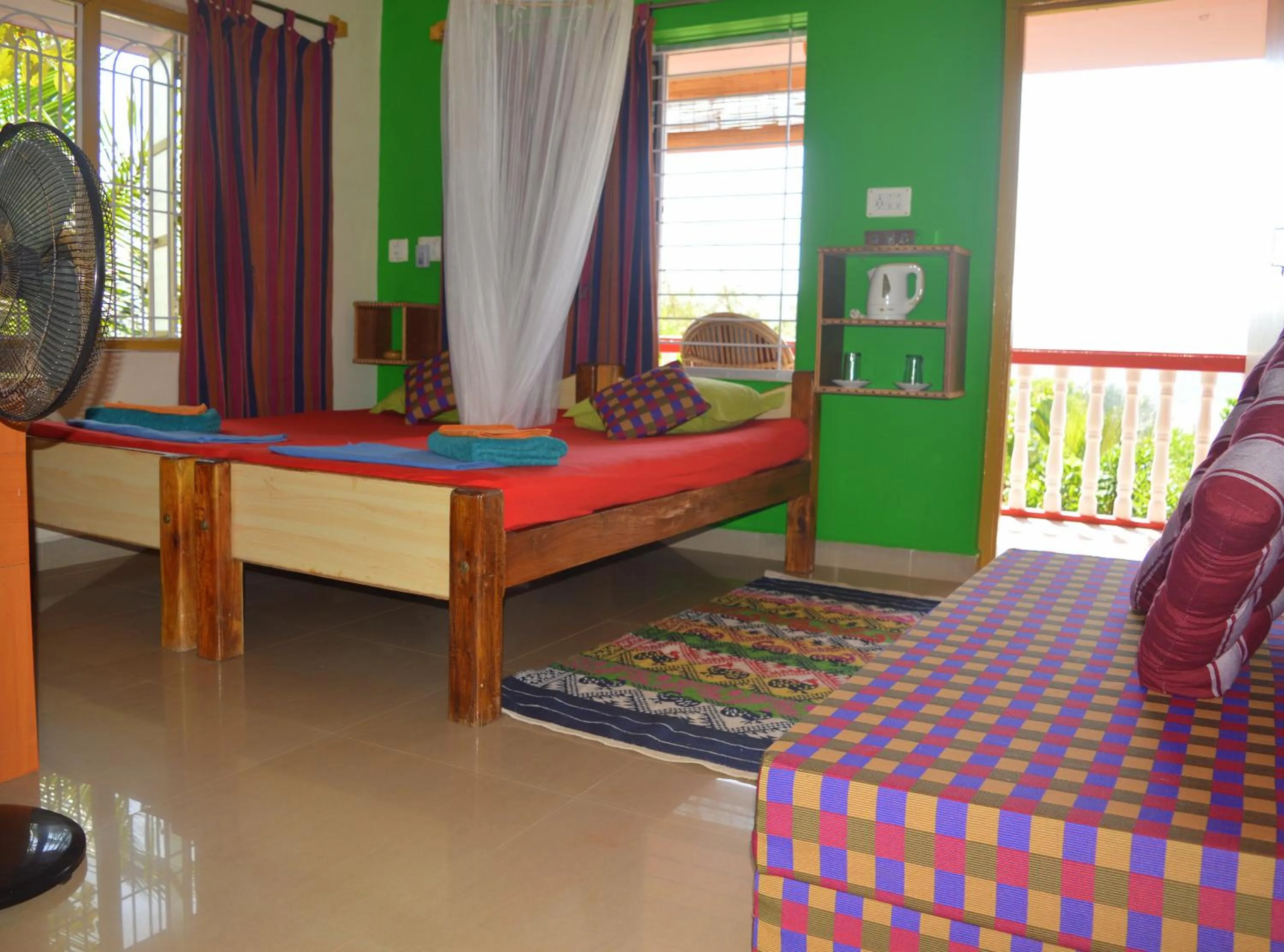 Photo of the whole room, Bed in Namaste Yoga Farm