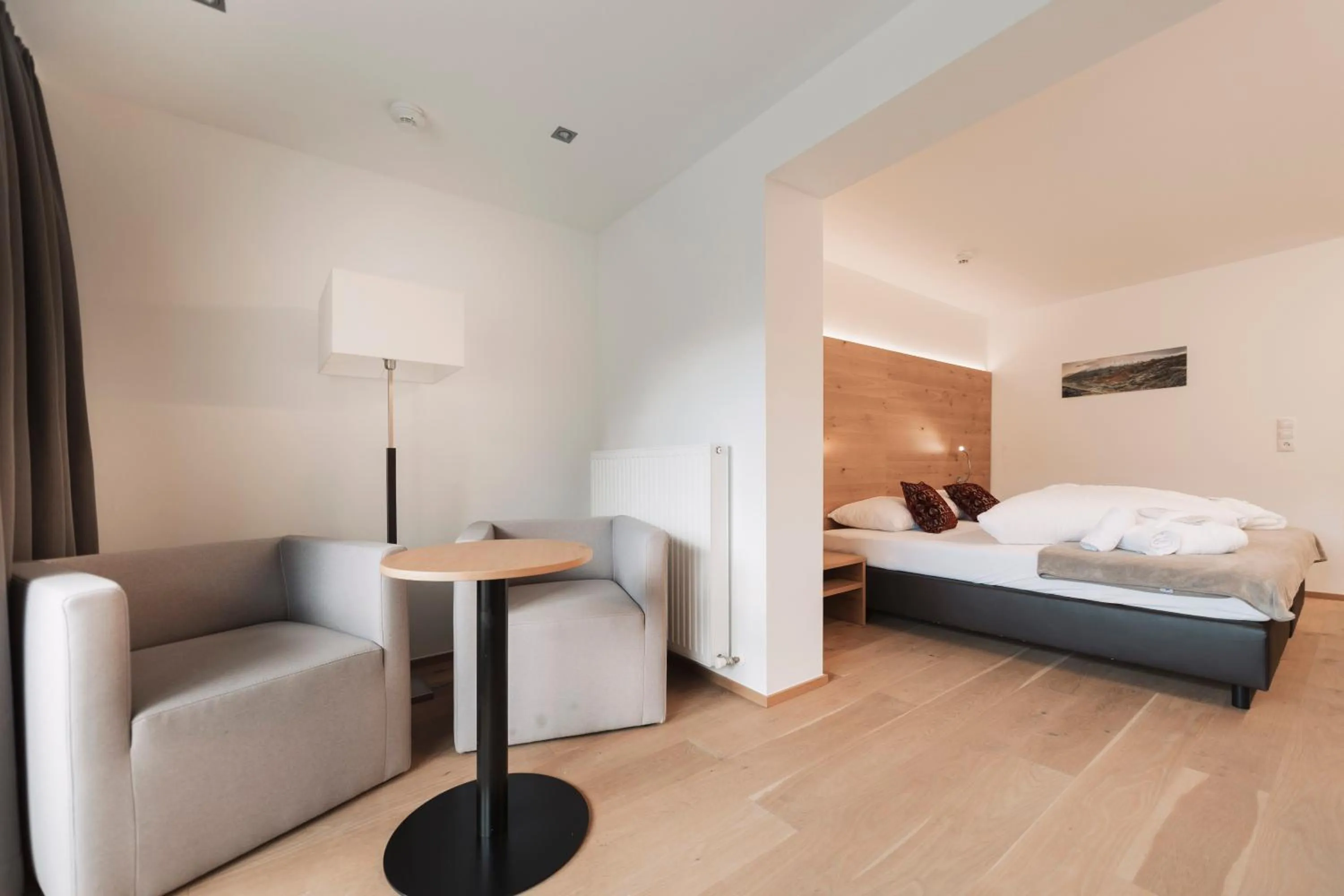 Seating area, Bed in Wellness Aparthotel Panorama Alpin - Ferienwohnungen Jerzens im Pitztal