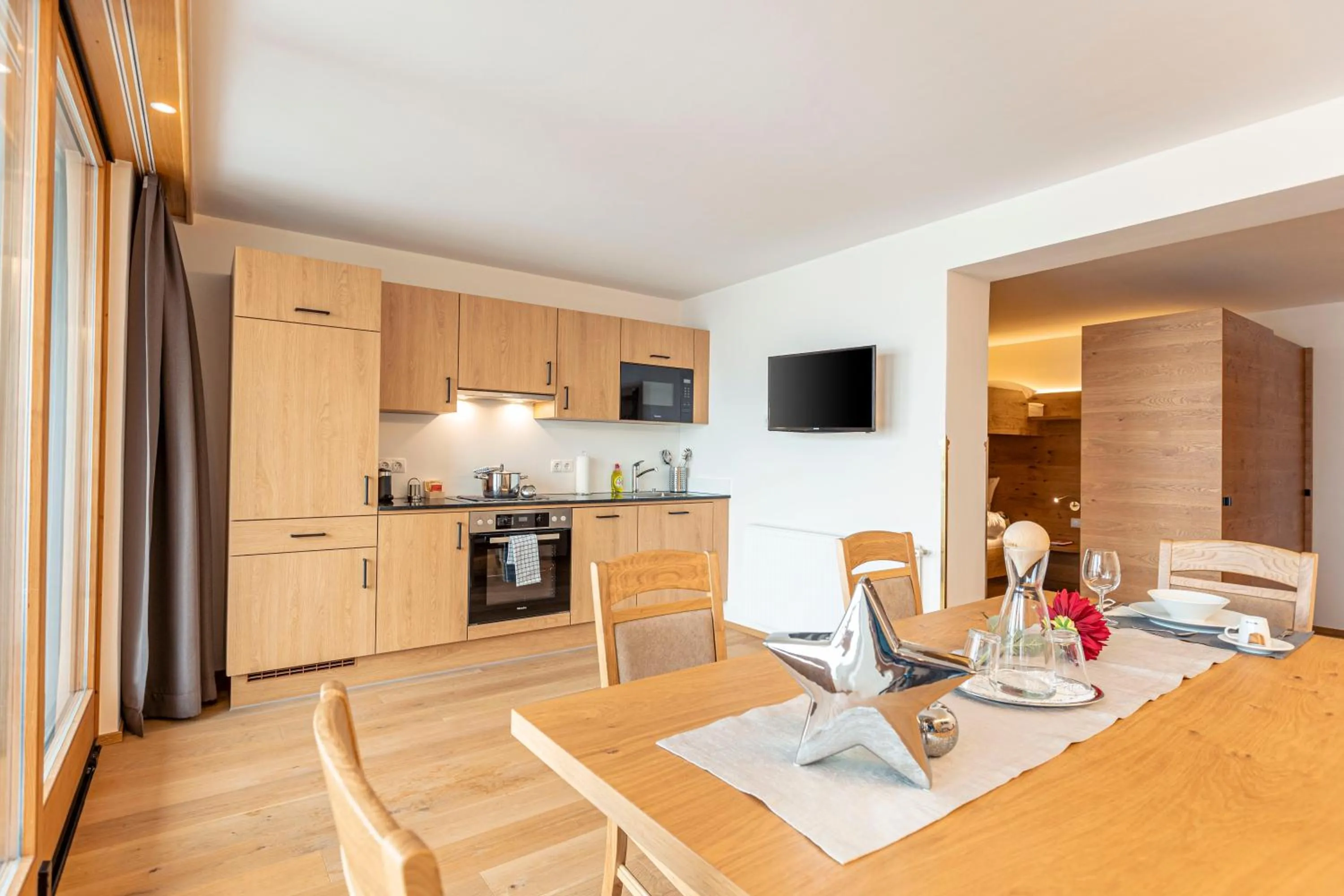 Kitchen or kitchenette in Wellness Aparthotel Panorama Alpin - Ferienwohnungen Jerzens im Pitztal