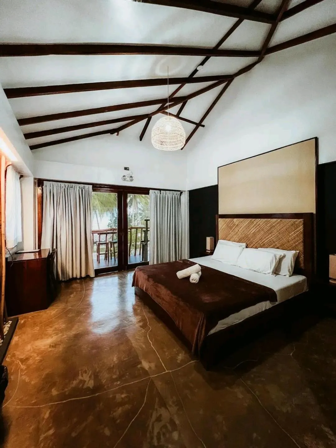 Bed in Lagkaw Siargao Villas