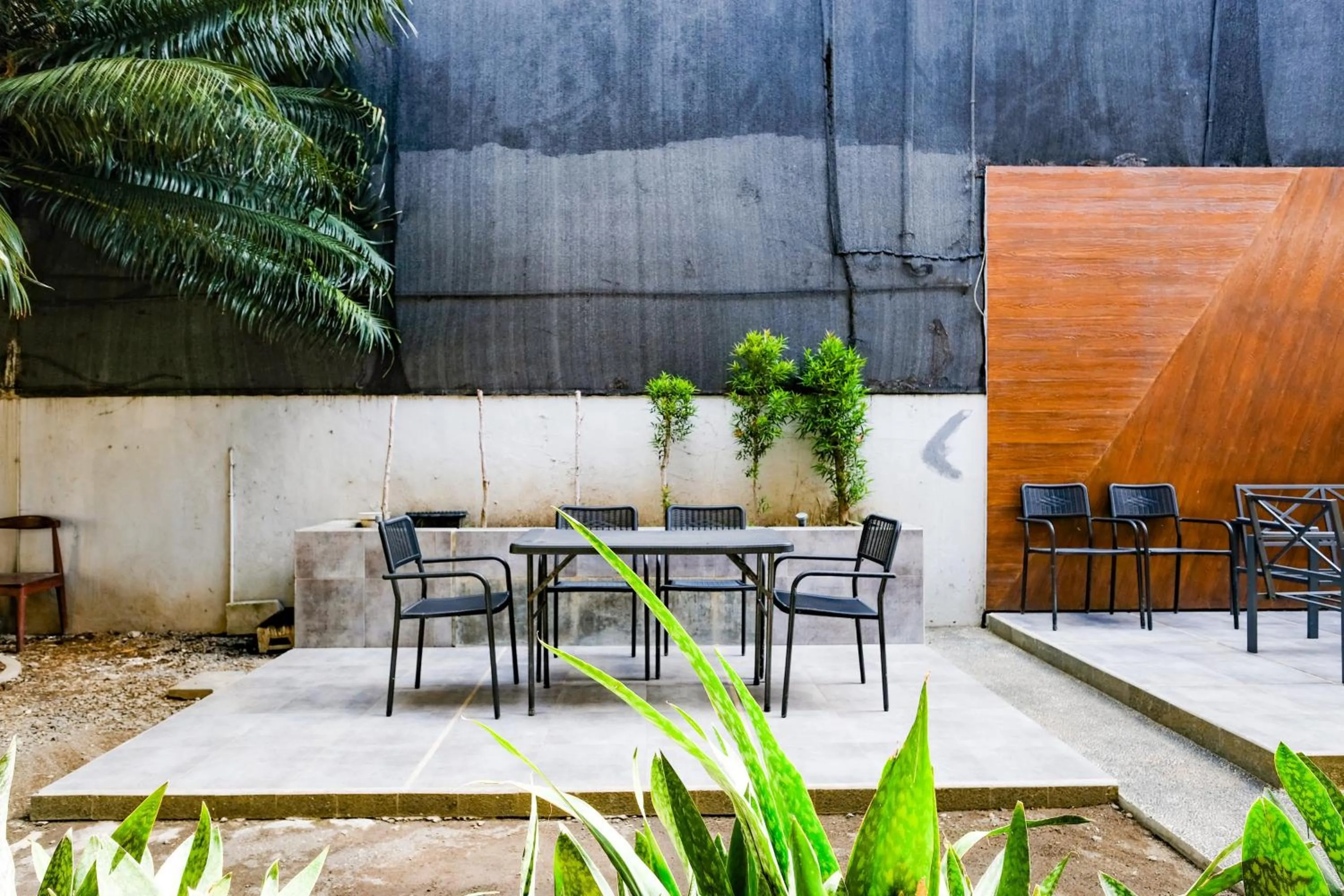 Seating area in Lega Legi Town House Seminyak by The Lavana