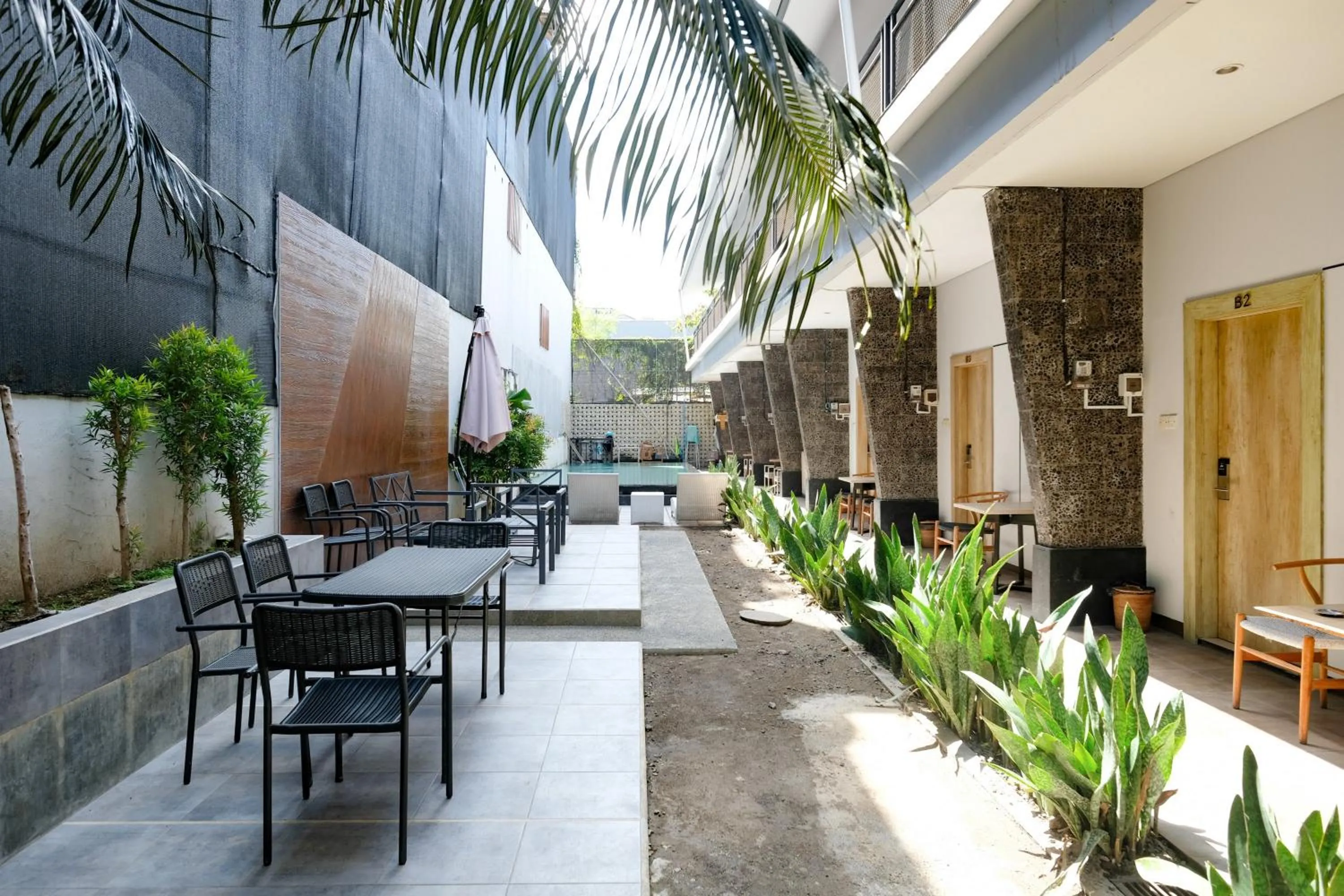 Seating area in Lega Legi Town House Seminyak by The Lavana