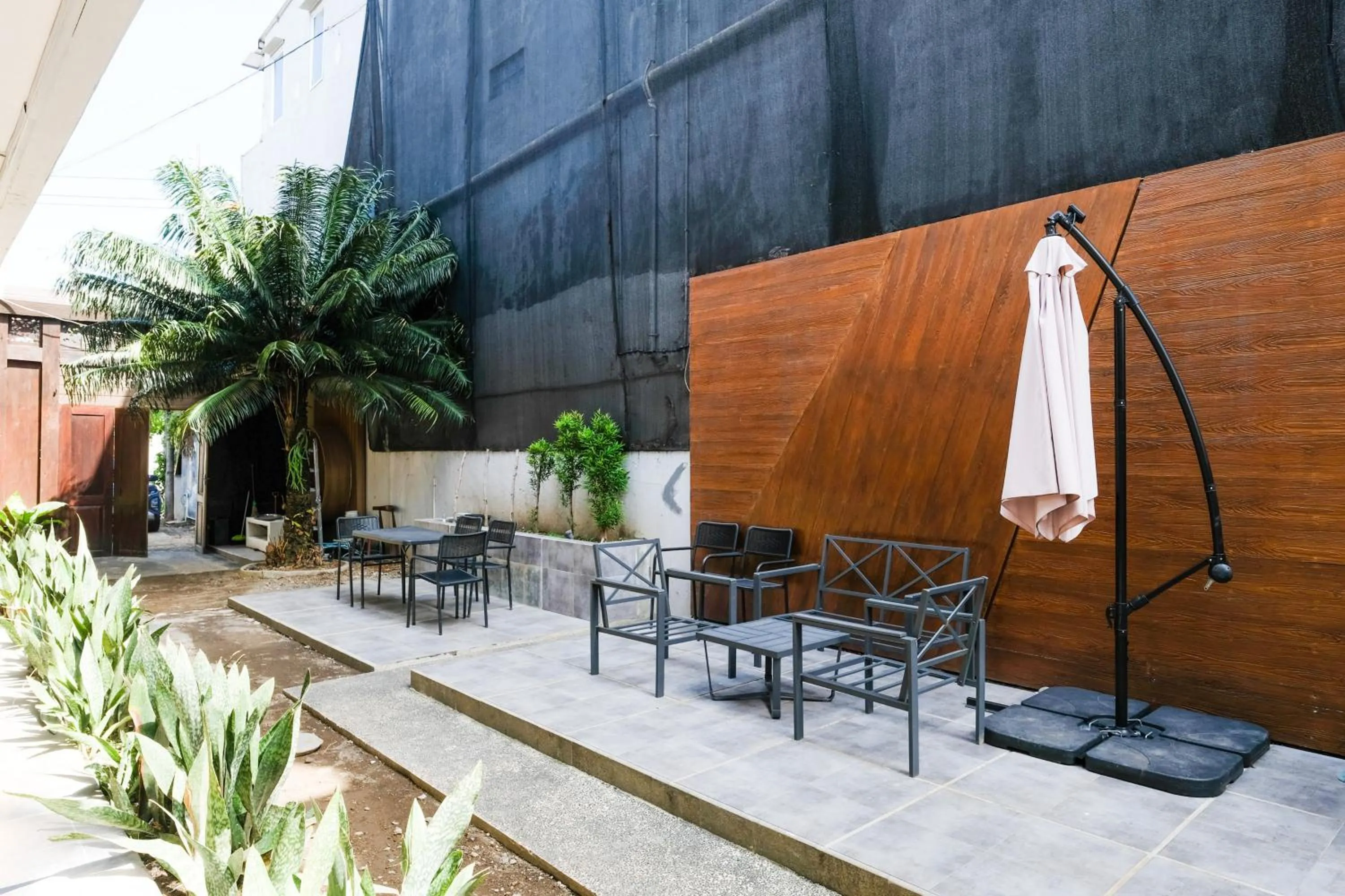 Seating area in Lega Legi Town House Seminyak by The Lavana