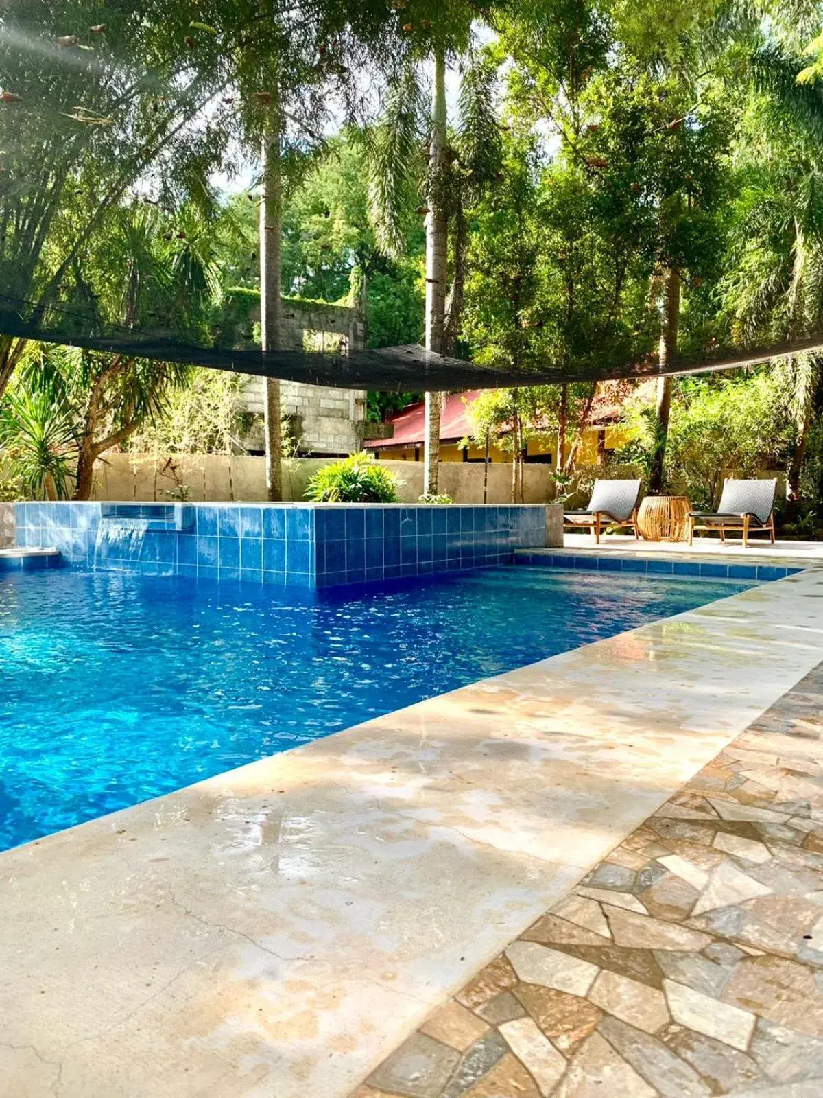 Swimming pool in The Henry Resort Taramindu Laiya Swimming pool in The Henry Resort Taramindu Laiya