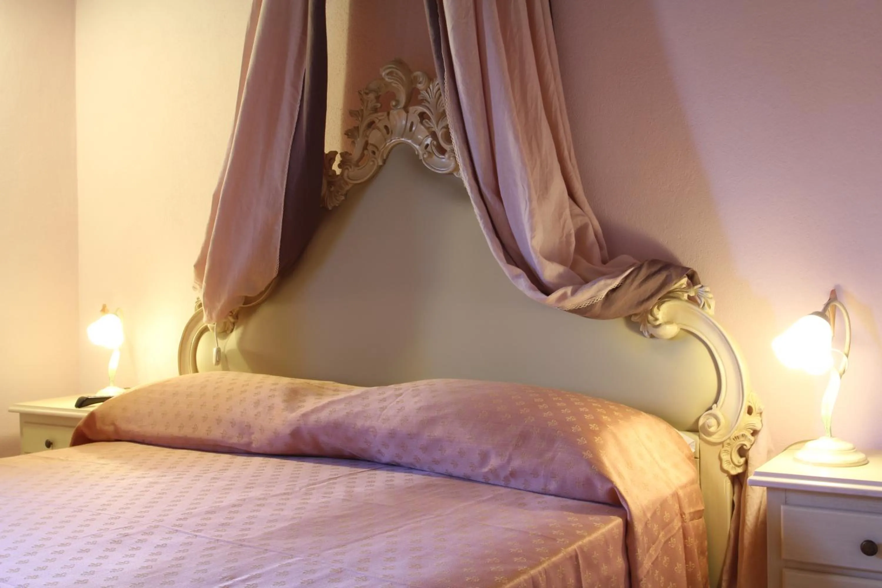 Bed in Relais La Leopolda