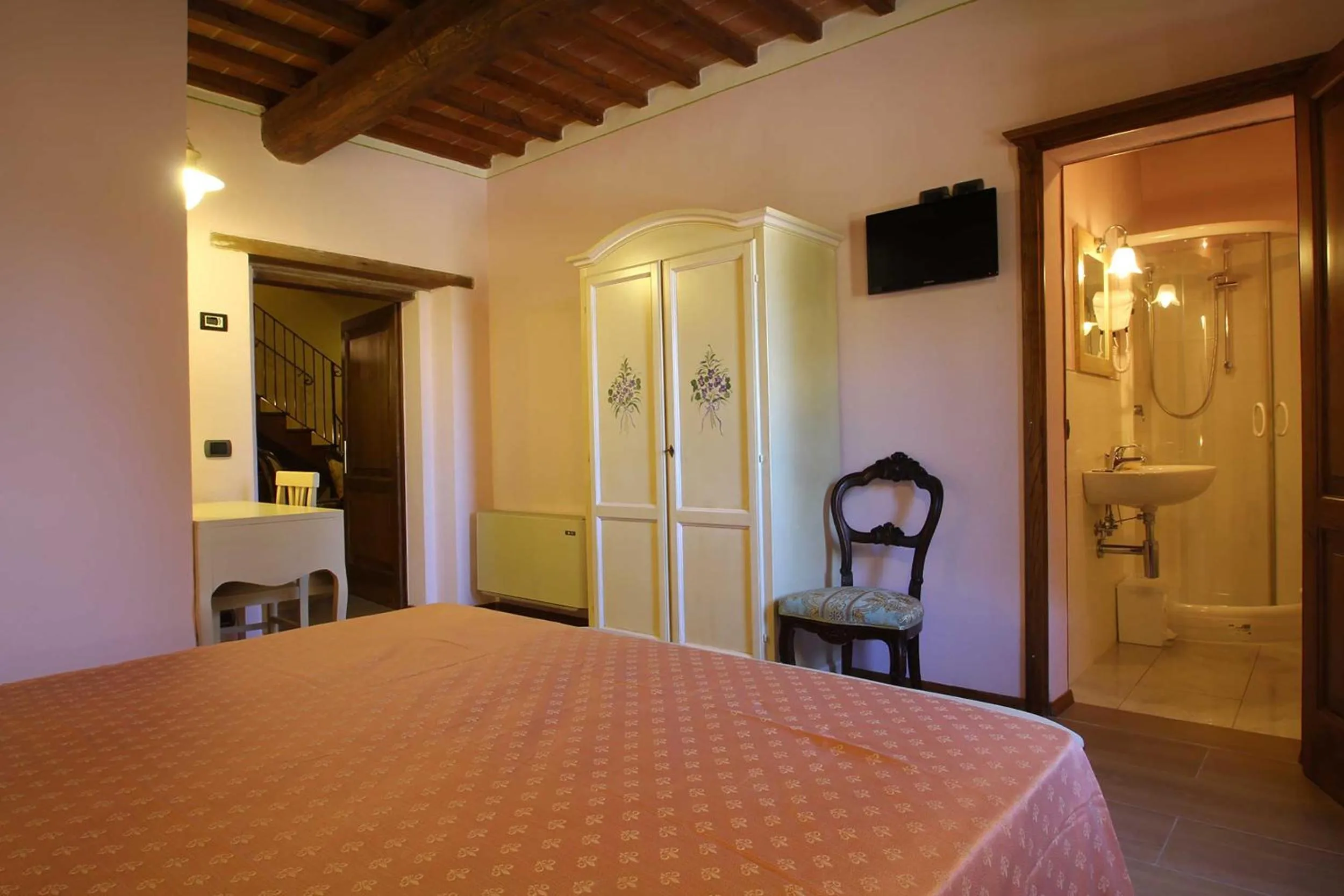 Communal lounge/ TV room, Bed in Relais La Leopolda