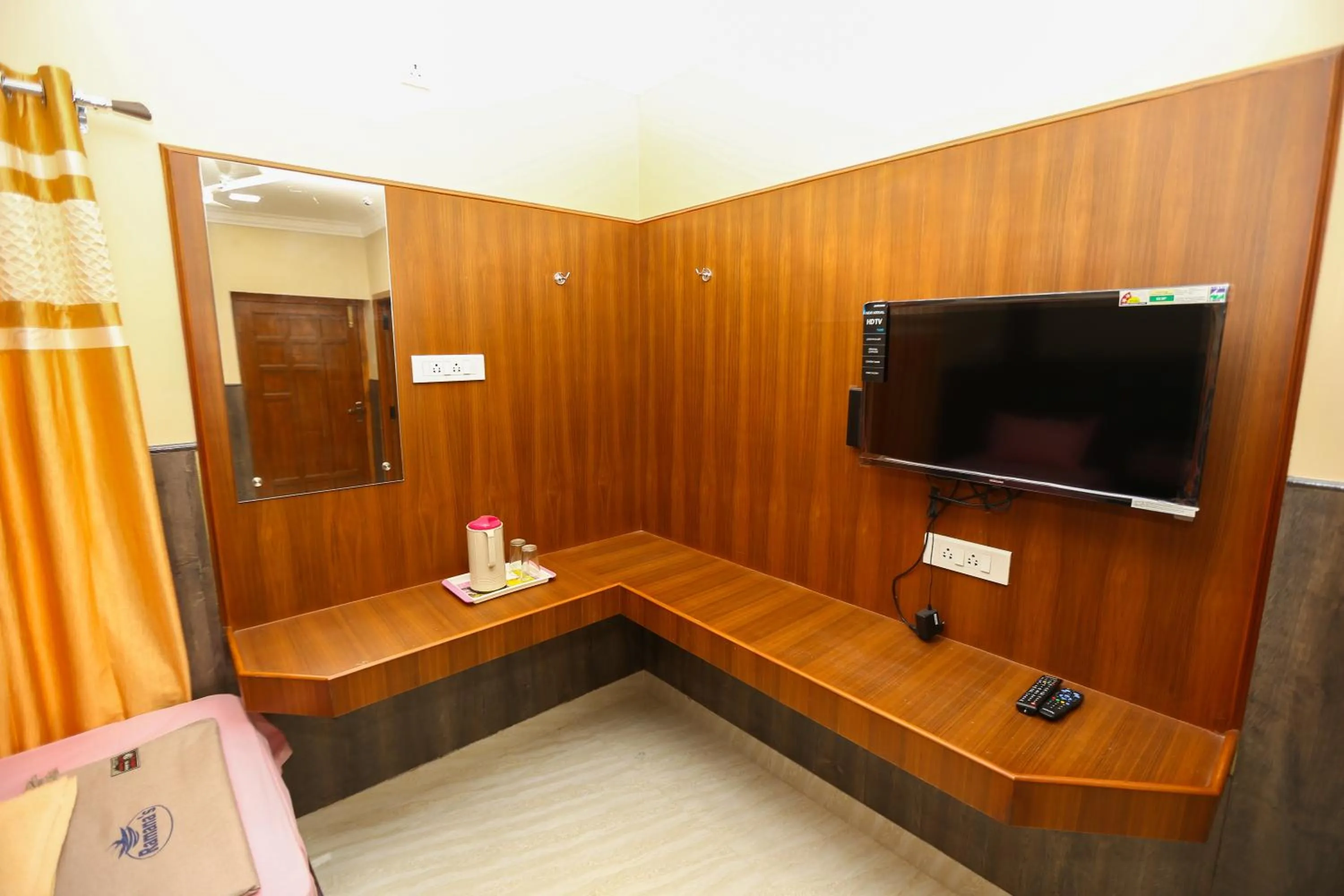 TV and multimedia in Ramana's Home Stay-Near Railway Station and Bus Stand