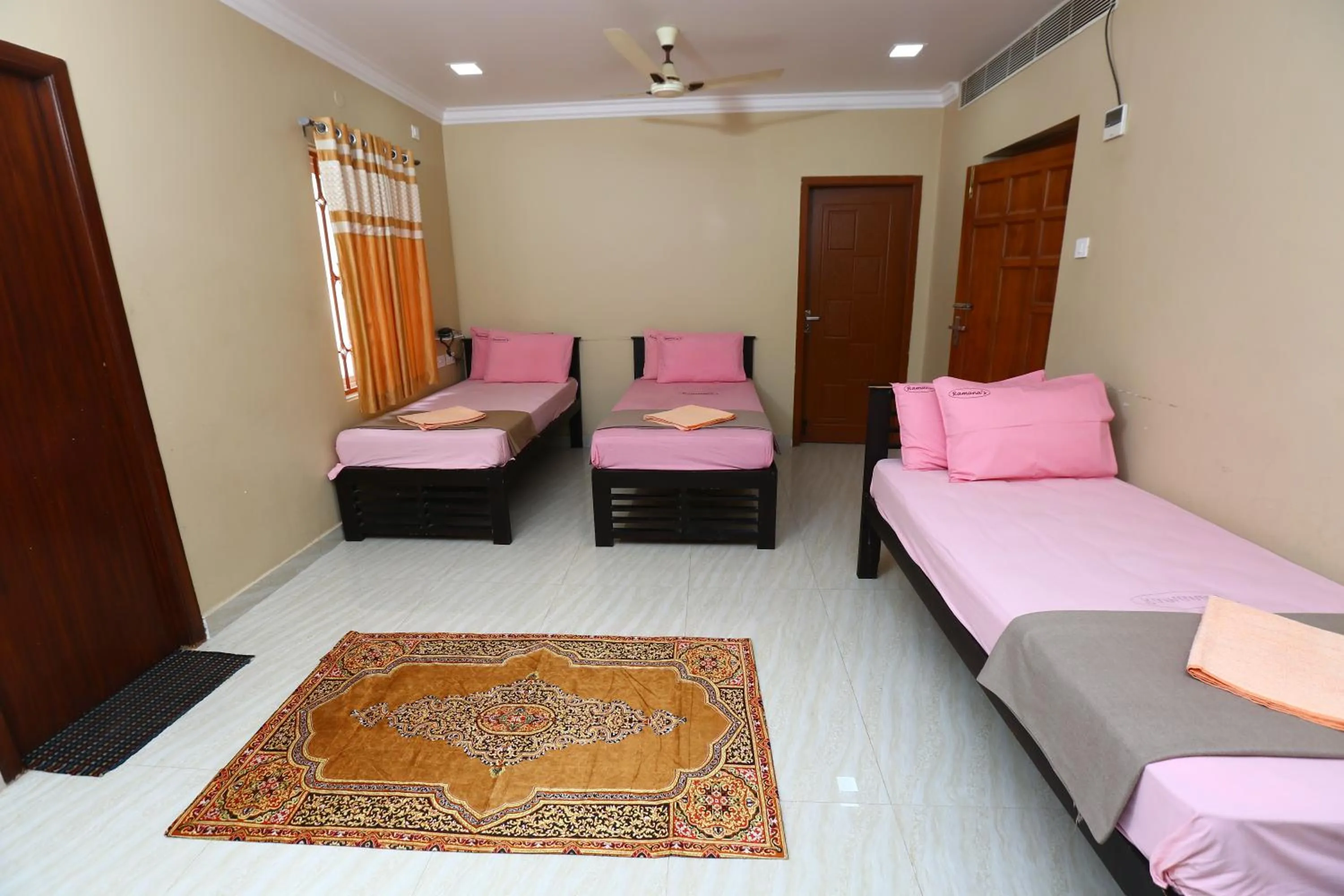 Bed in Ramana's Home Stay-Near Railway Station and Bus Stand