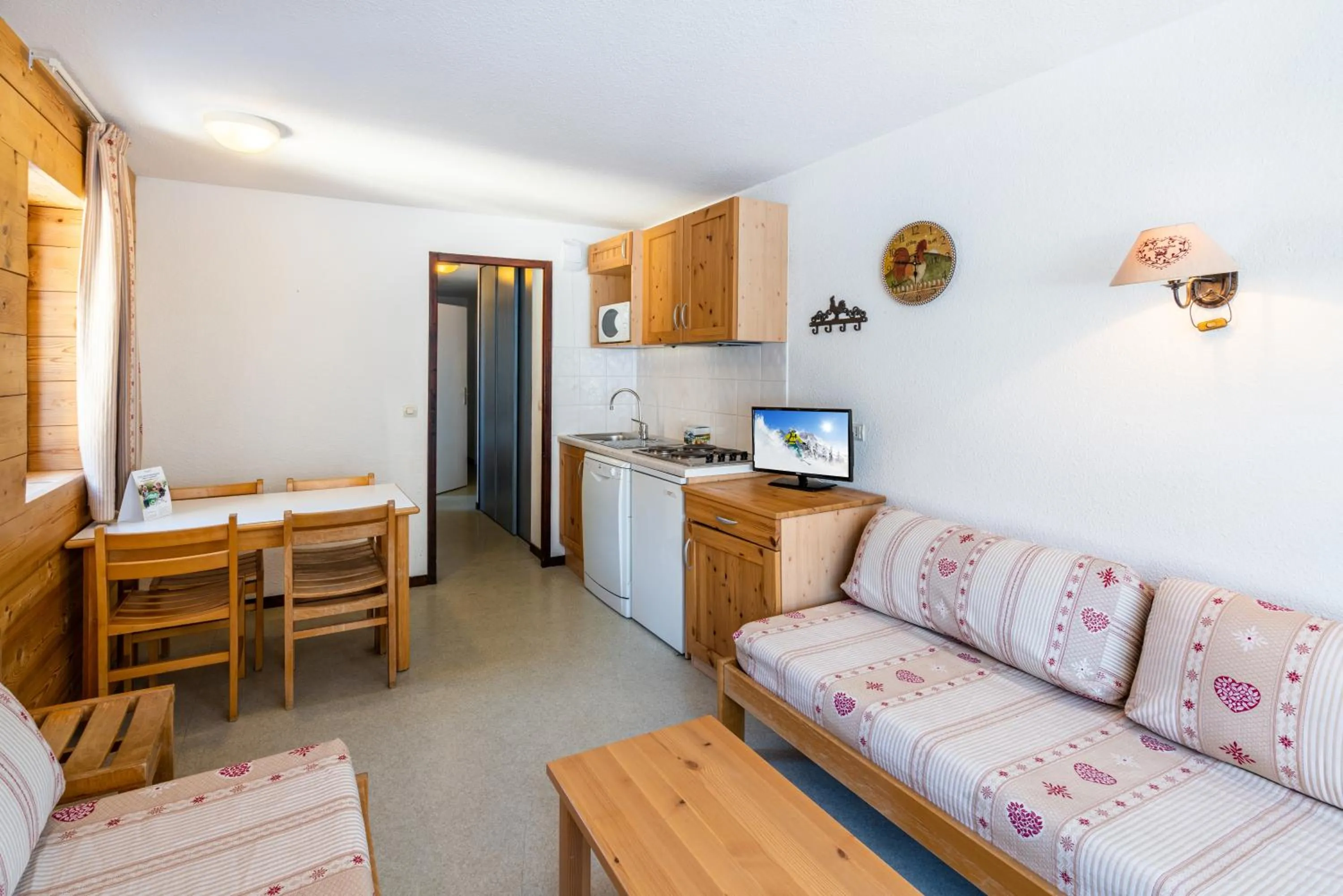 Kitchen or kitchenette in Vacancéole - Résidence Grand Morillon