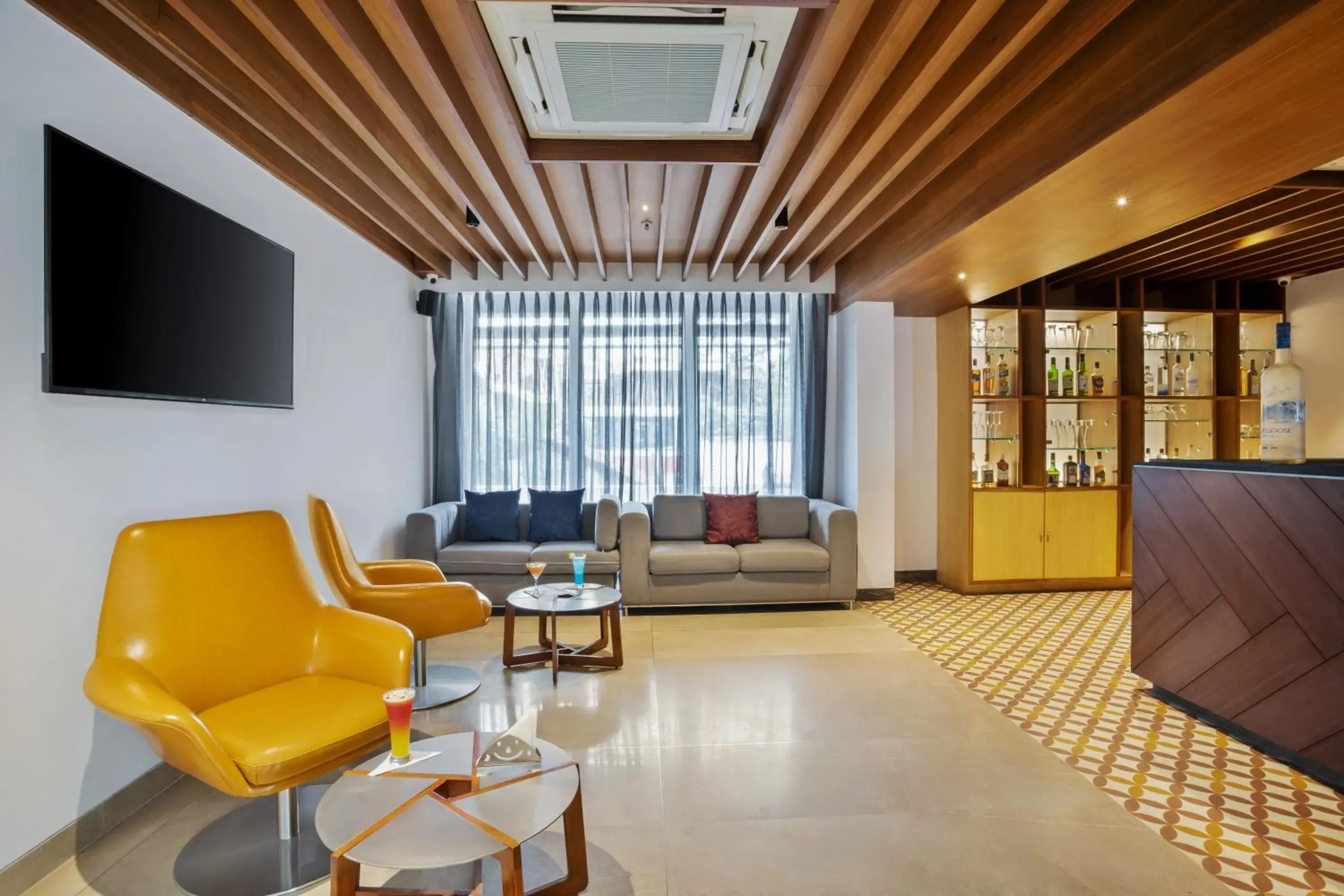 Lounge or bar in De Mandarin Hotel Goa Lounge or bar in De Mandarin Hotel Goa