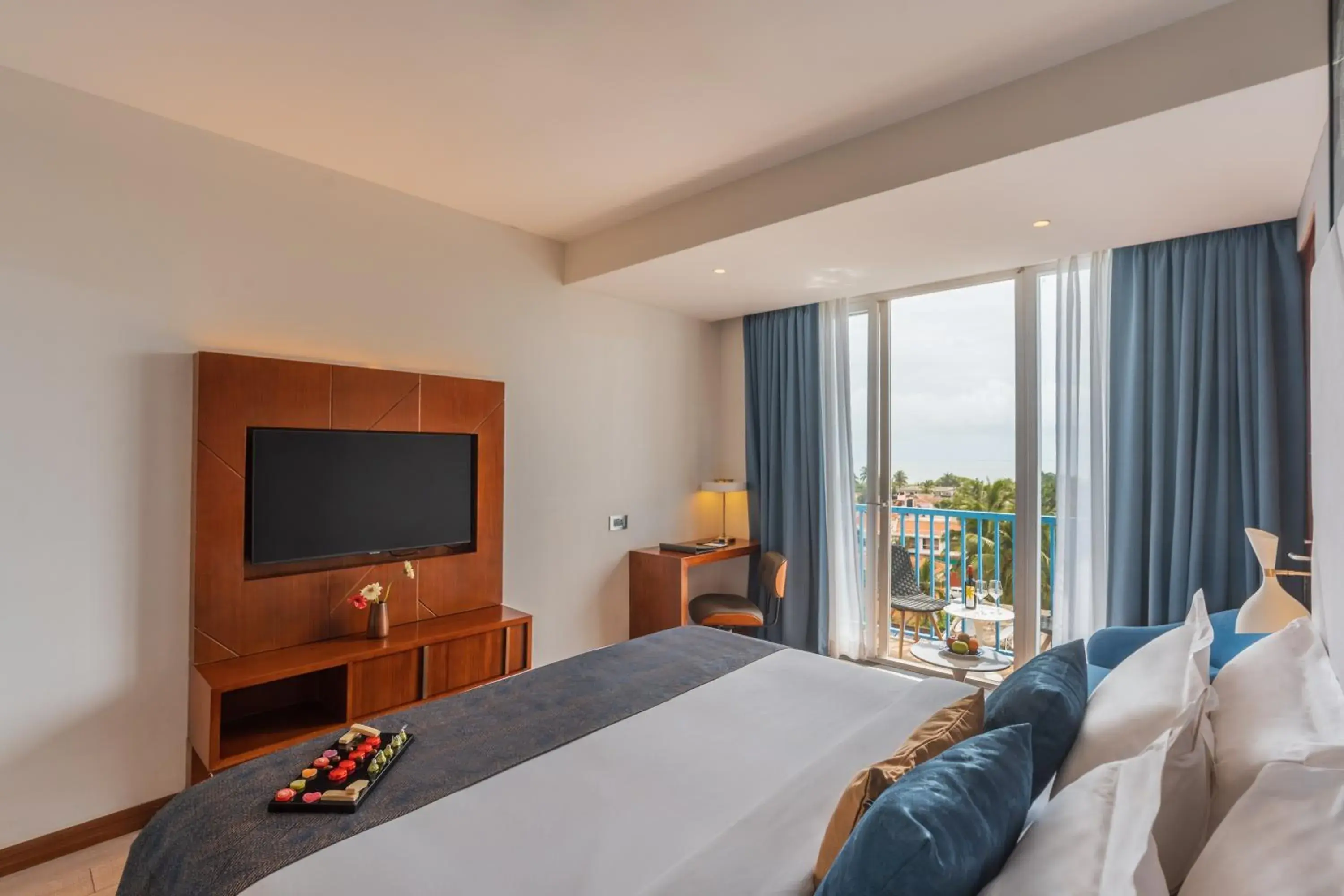 Bed in De Mandarin Hotel Goa Bed in De Mandarin Hotel Goa