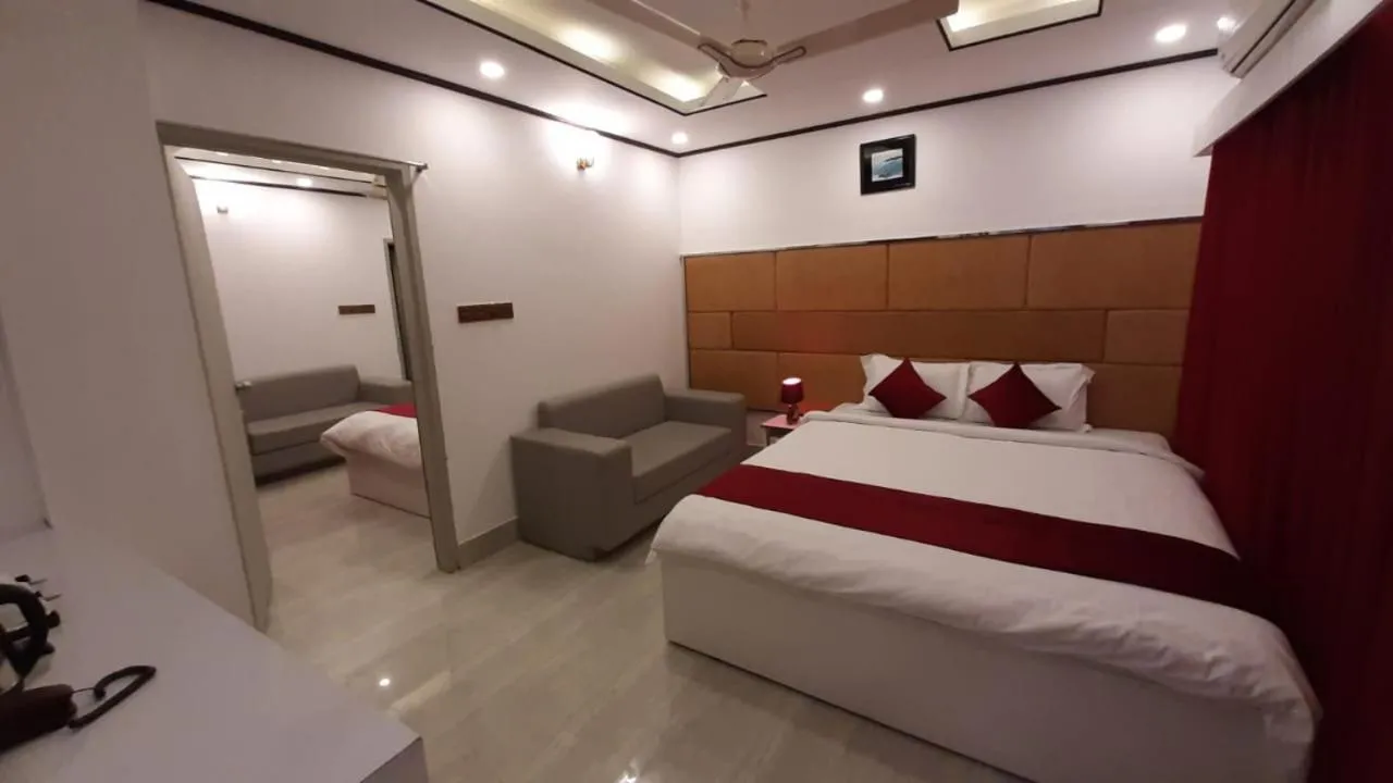 Bed in The Grand Mafi Hotel & Spa
