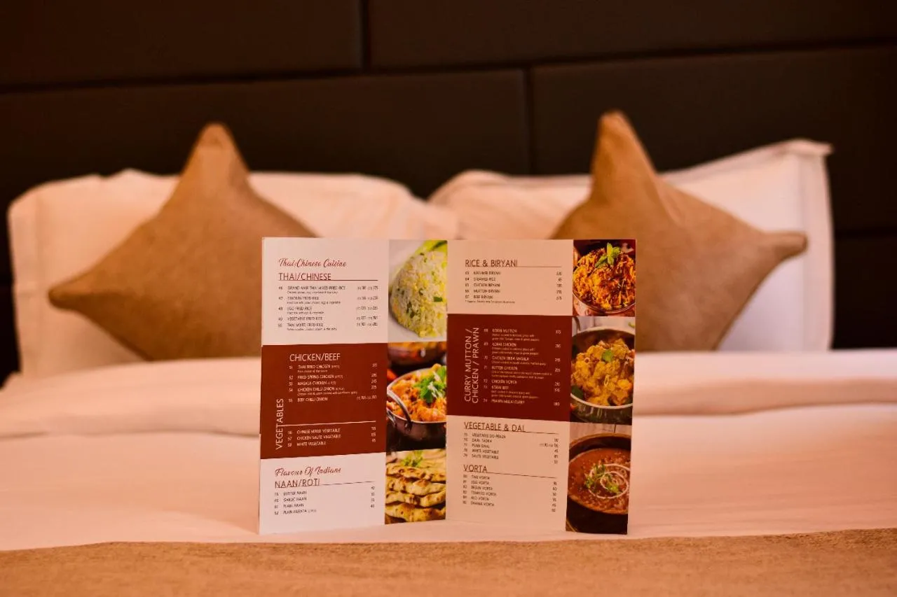 Bed in The Grand Mafi Hotel & Spa