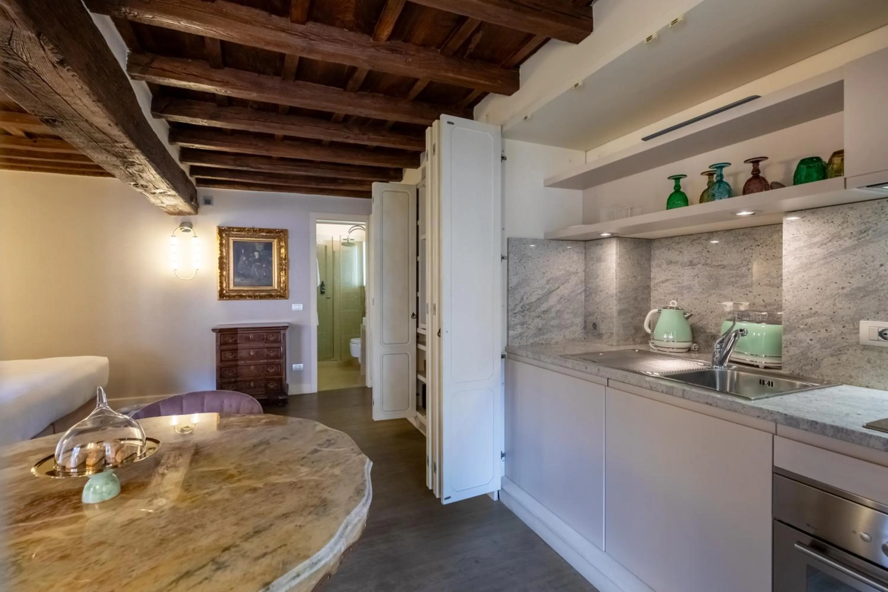 Kitchen or kitchenette in Ara di Marte Suites