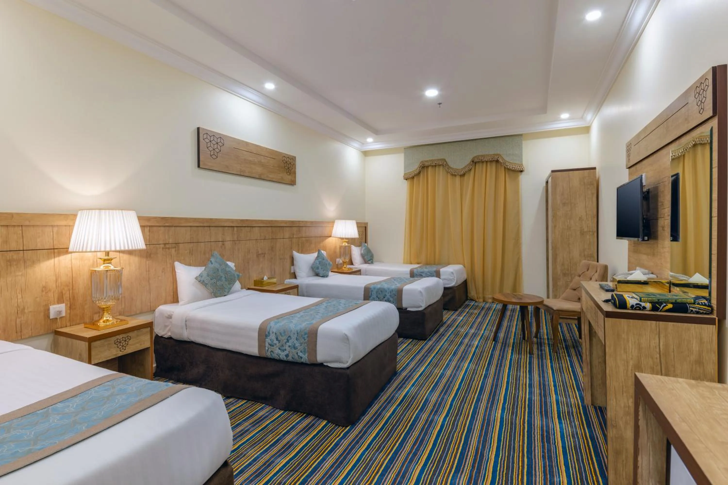 Bed in Snood Al Dana Hotel