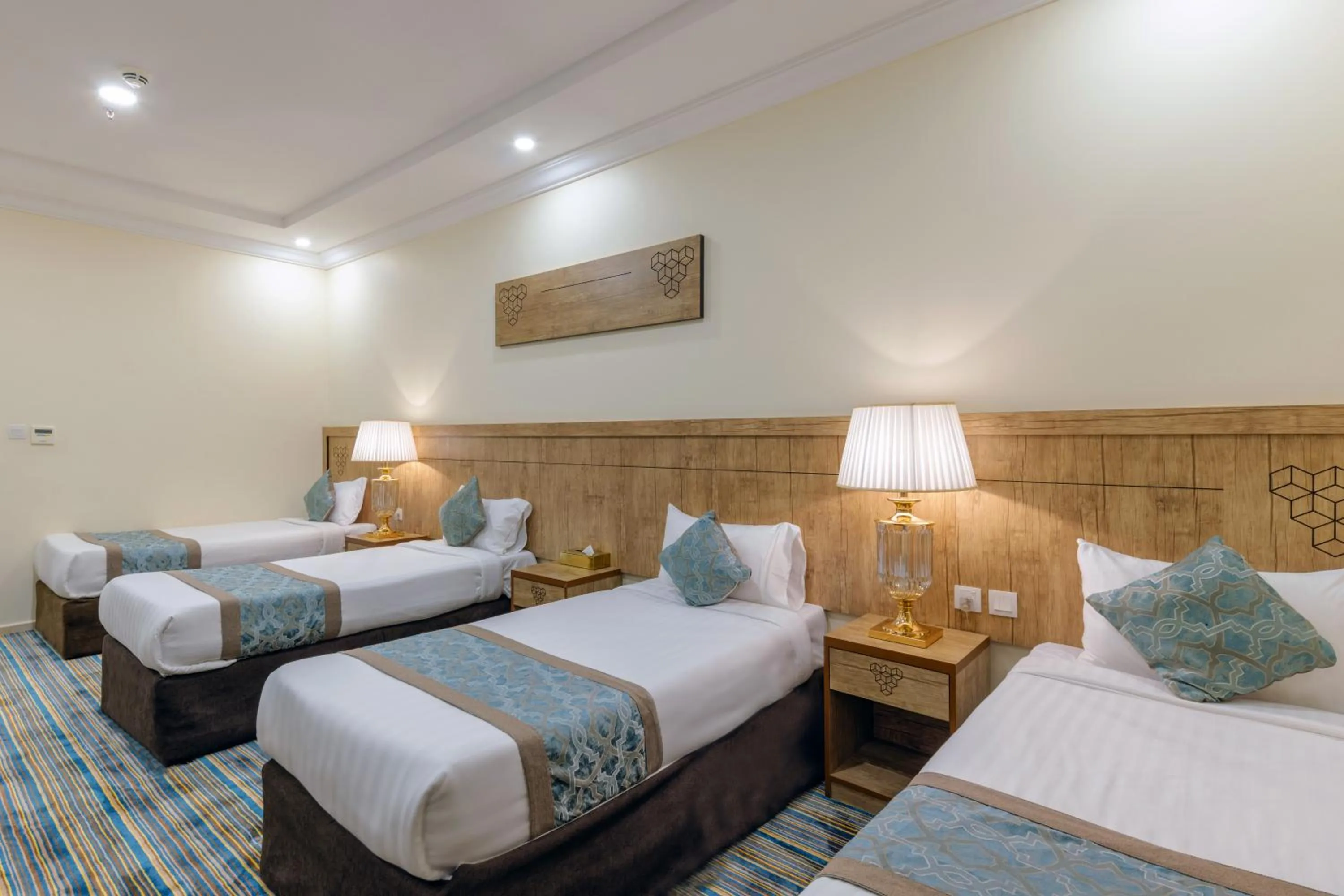 Bed in Snood Al Dana Hotel