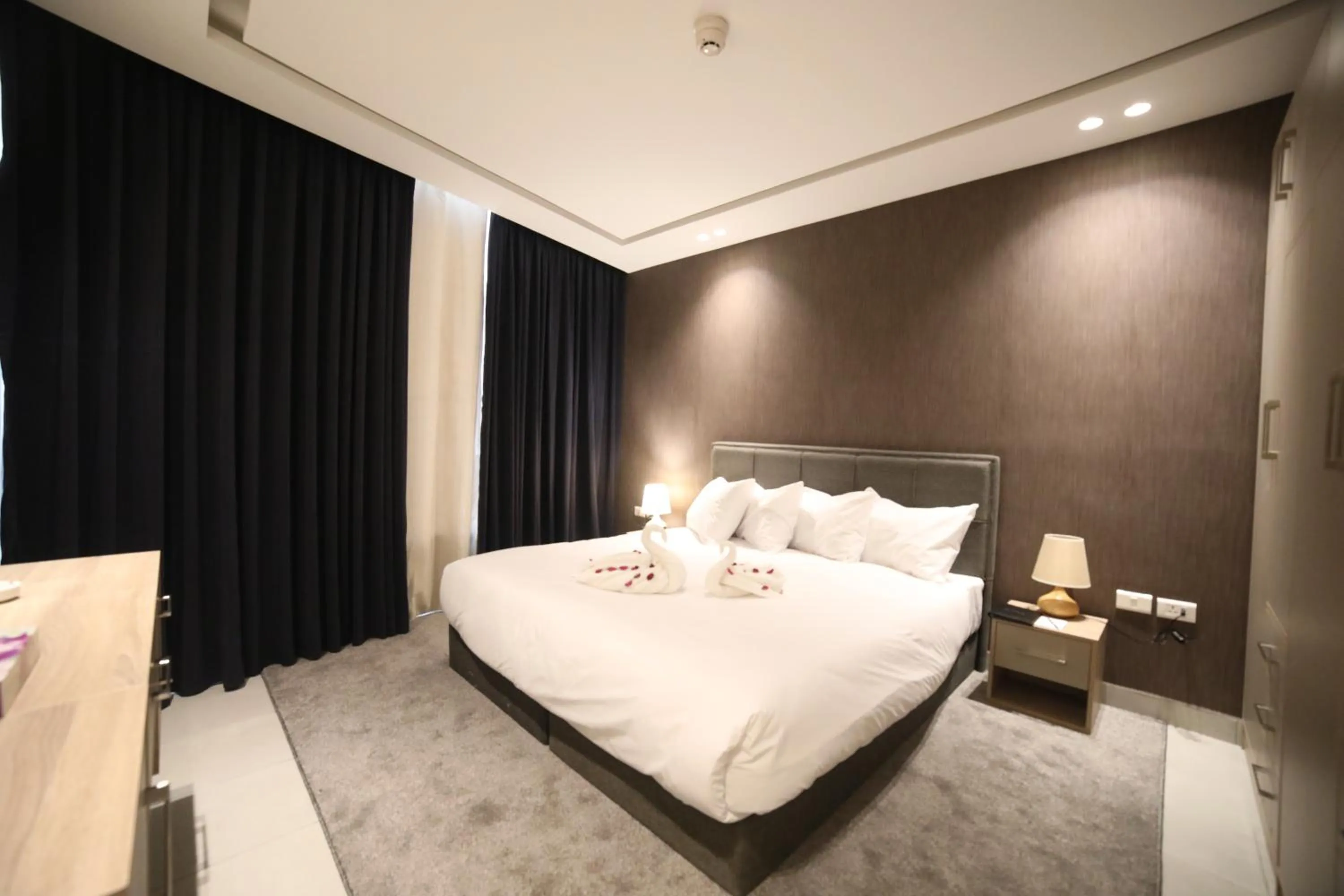 Bed in فندق صحارى الخليج Sahara Gulf Hotel Apartments