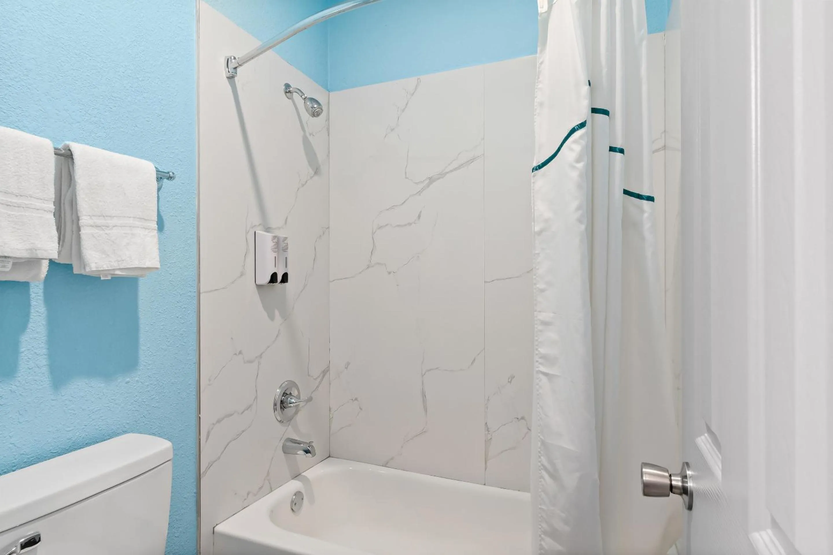 Bathroom in HomeTowne Studios by Red Roof San Antonio E - Frost Bank Center