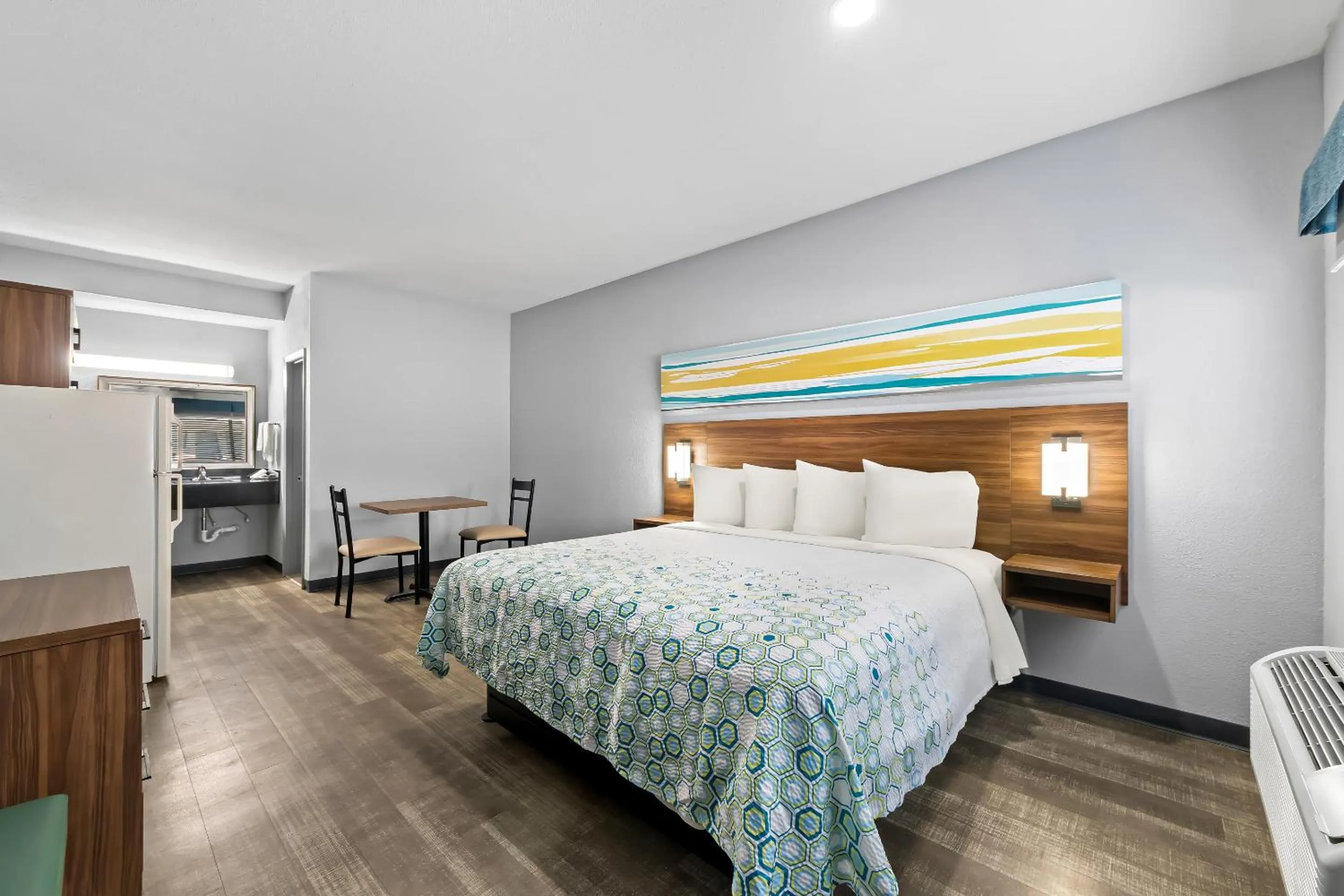 Photo of the whole room, Bed in HomeTowne Studios by Red Roof San Antonio E - Frost Bank Center