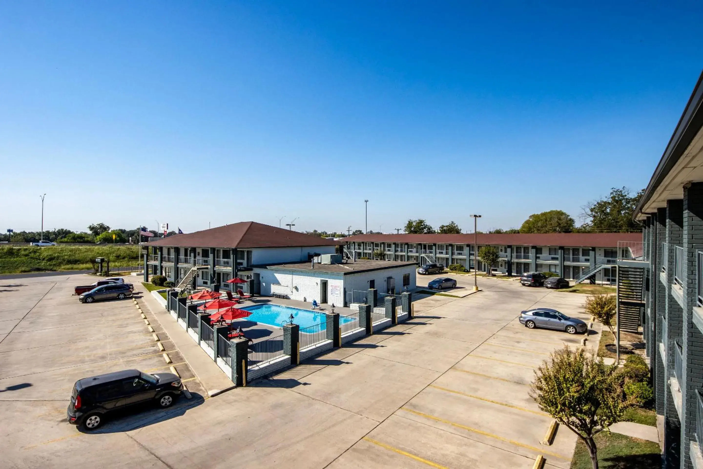 Property building in HomeTowne Studios by Red Roof San Antonio E - Frost Bank Center Property building in HomeTowne Studios by Red Roof San Antonio E - Frost Bank Center