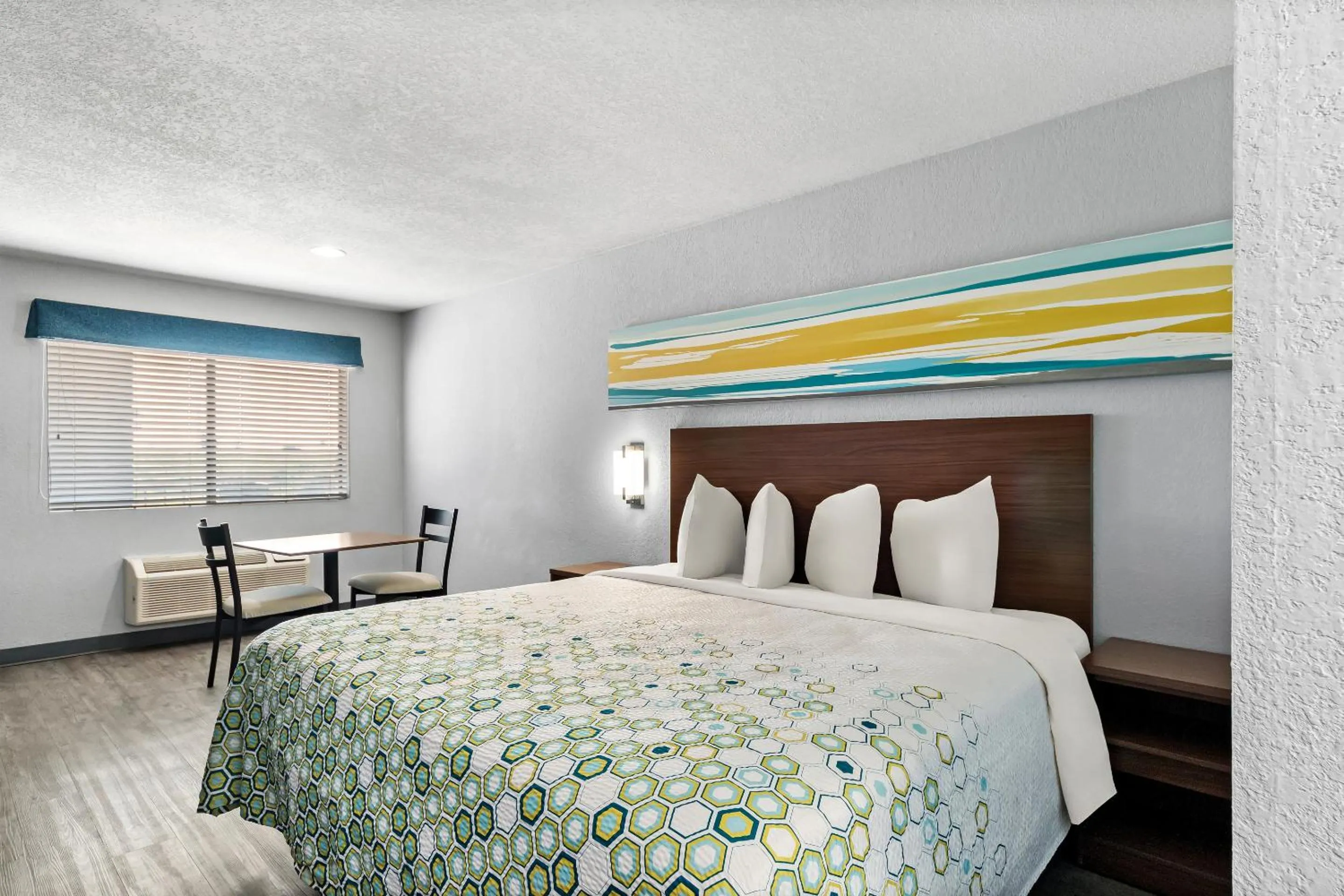 Photo of the whole room, Bed in HomeTowne Studios by Red Roof San Antonio E - Frost Bank Center