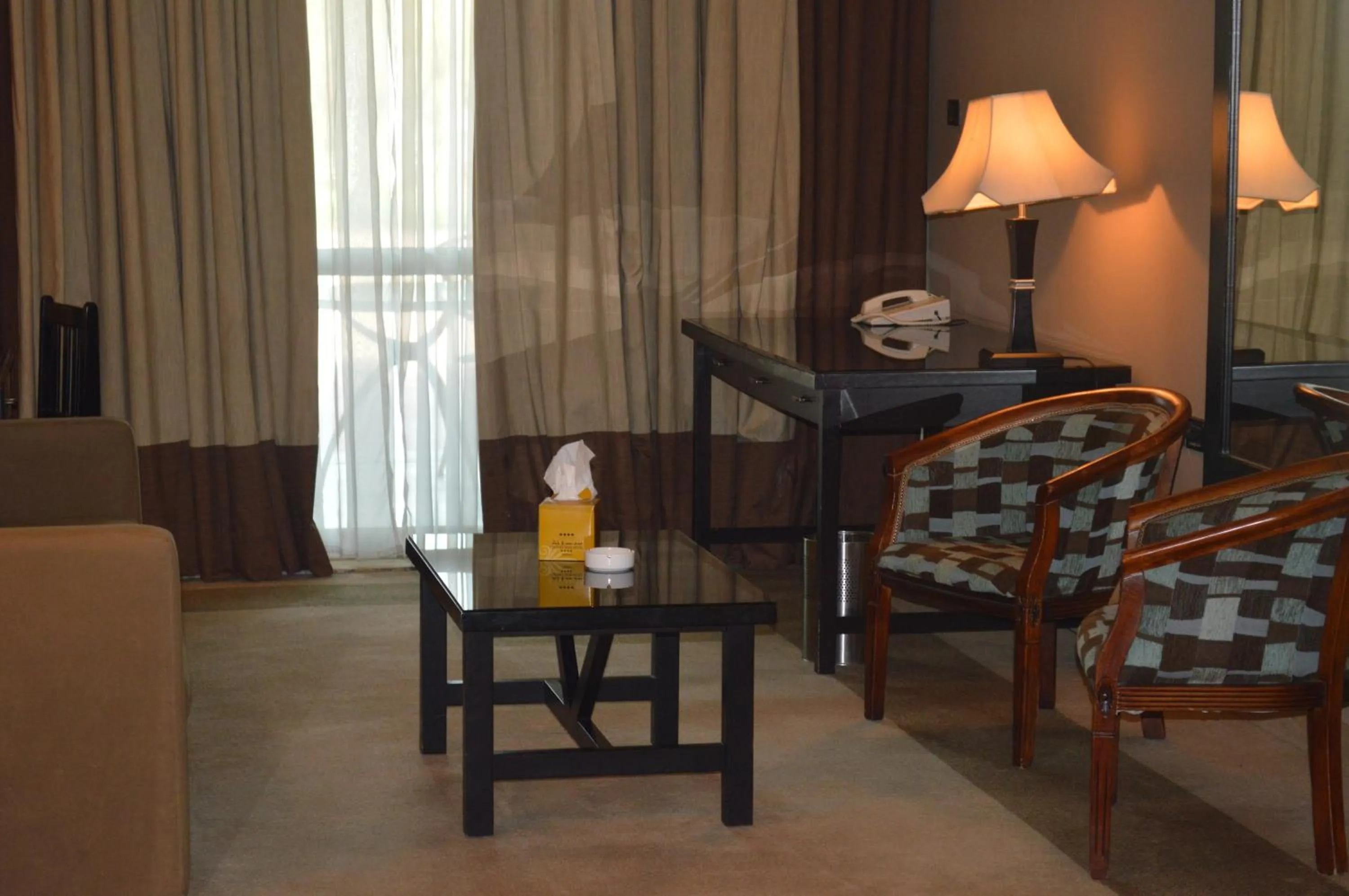 Communal lounge/ TV room in Century Park Hotel