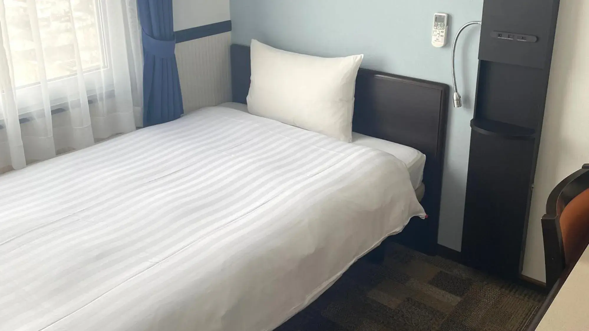 Bedroom, Bed in Toyoko Inn Saitama Iwatsuki Ekimae Bedroom, Bed in Toyoko Inn Saitama Iwatsuki Ekimae