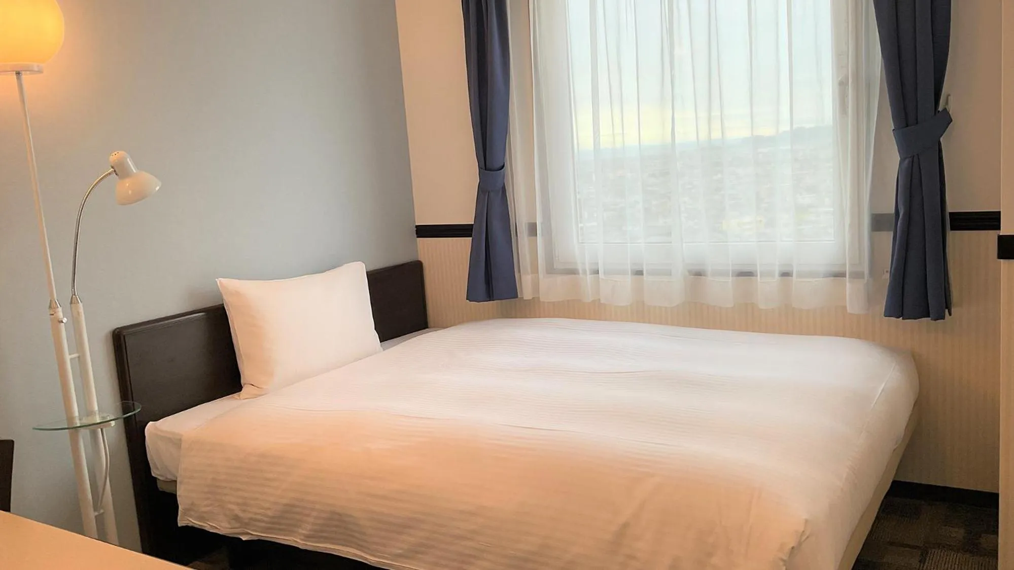 Bedroom, Bed in Toyoko Inn Niihama Ekimae