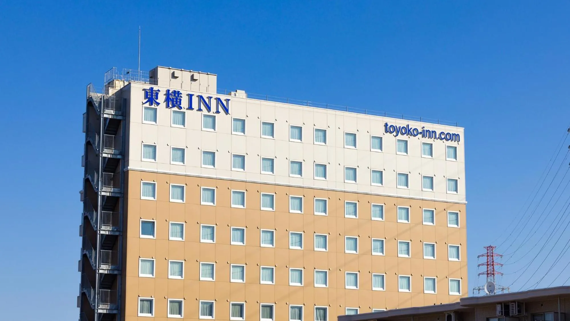 Property logo or sign in Toyoko Inn Tokyo Fuchu Nambu sen Minami tama Ekimae