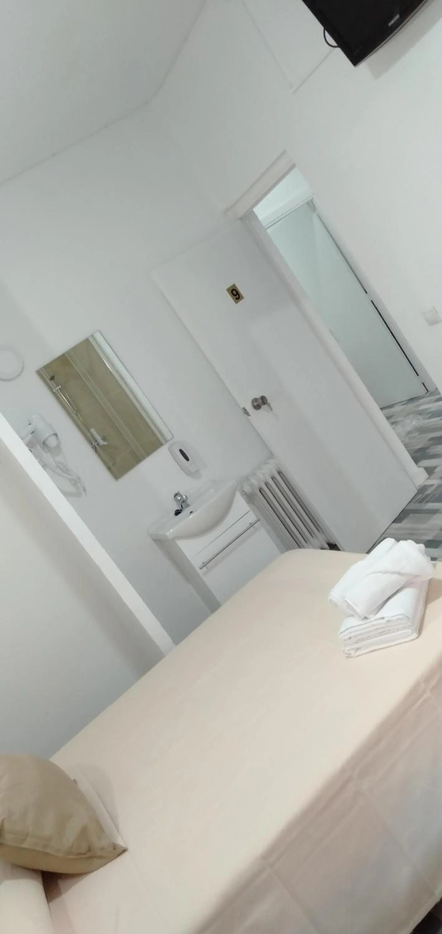 Bed in HOSTAL Noche y Dia