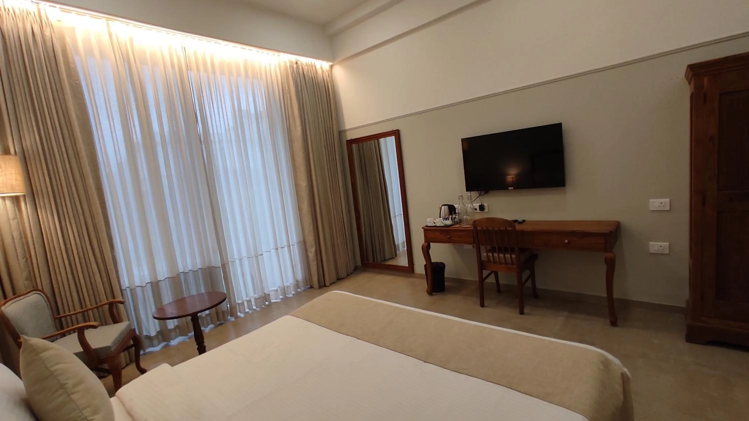 Bed in juSTa Rudra Resort & Spa