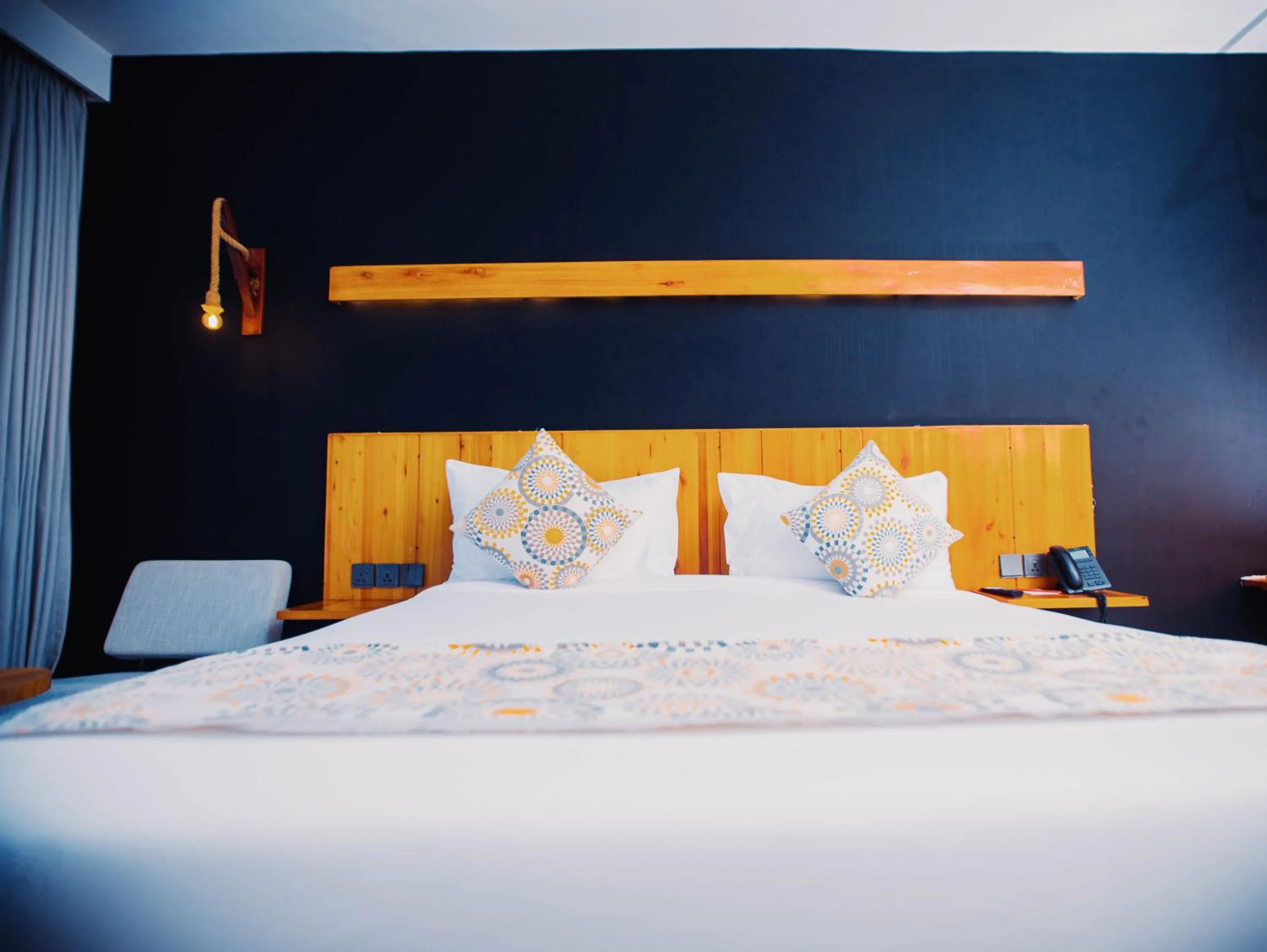 Bed in Giraffe Beach Hotel