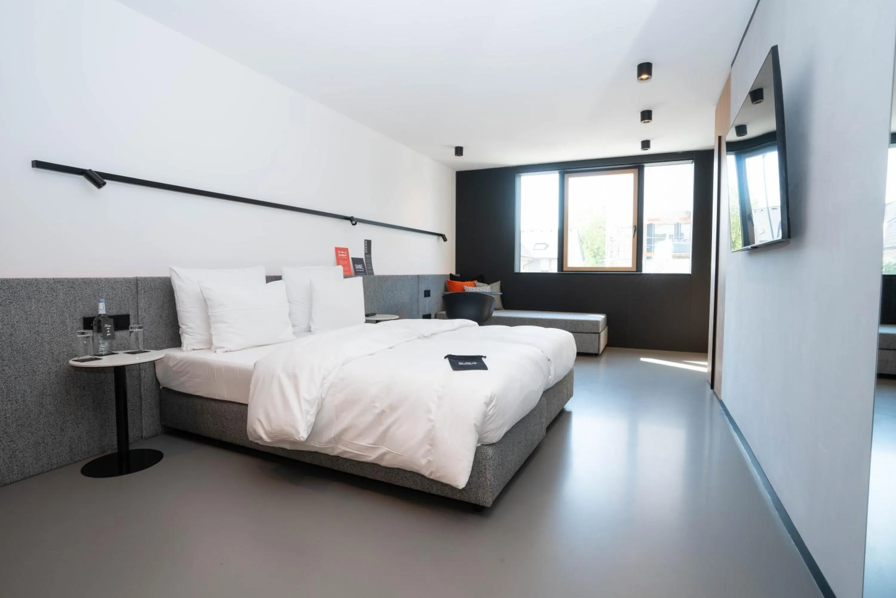 Photo of the whole room, Bed in GREFIS Hotel München-Gräfelfing