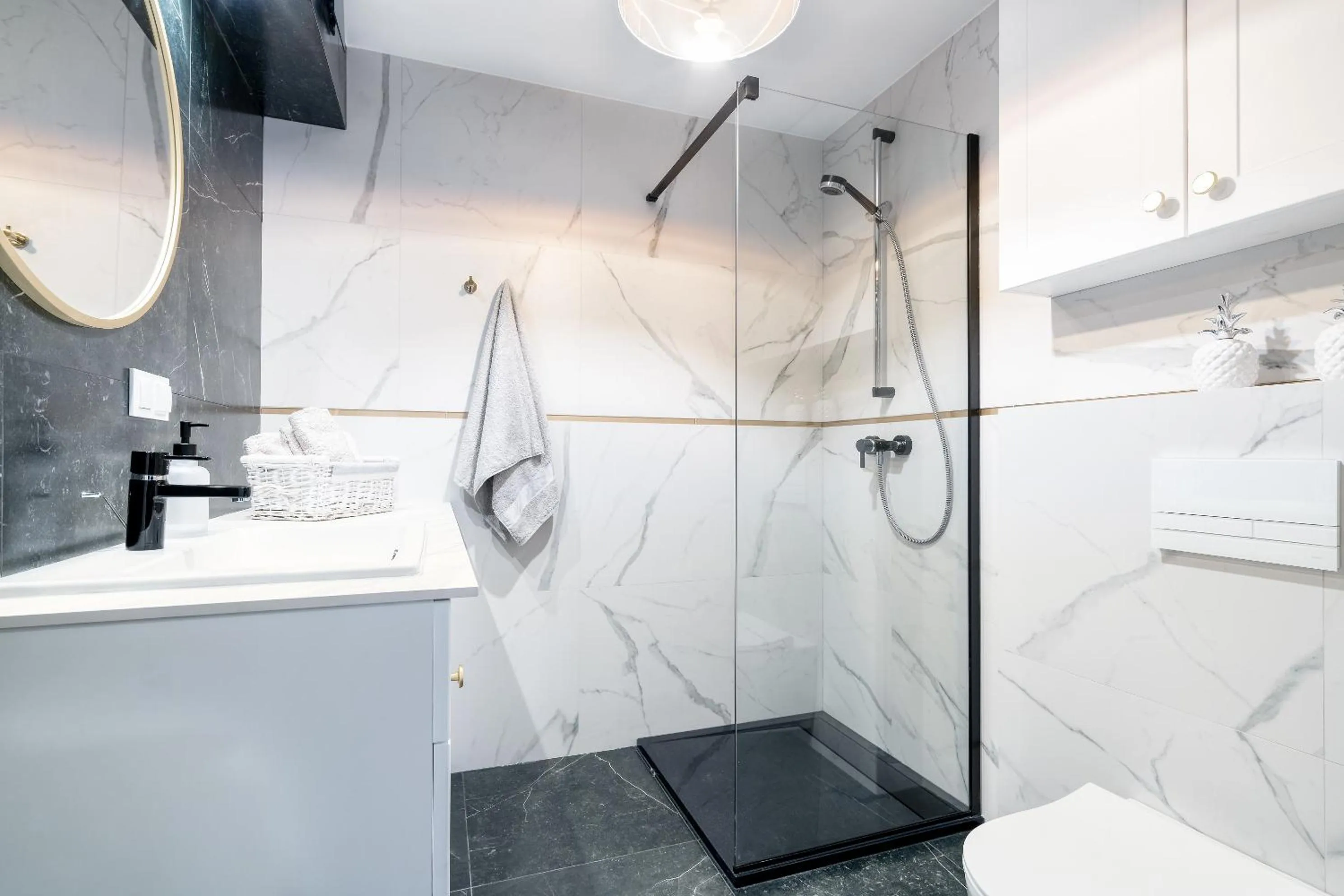 Bathroom in Miodowa Faktoria #7 by Rentoom