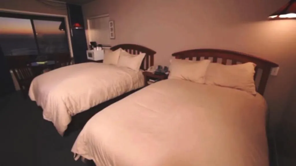 Bed in Gualala Surf Inn on the ocean bluff