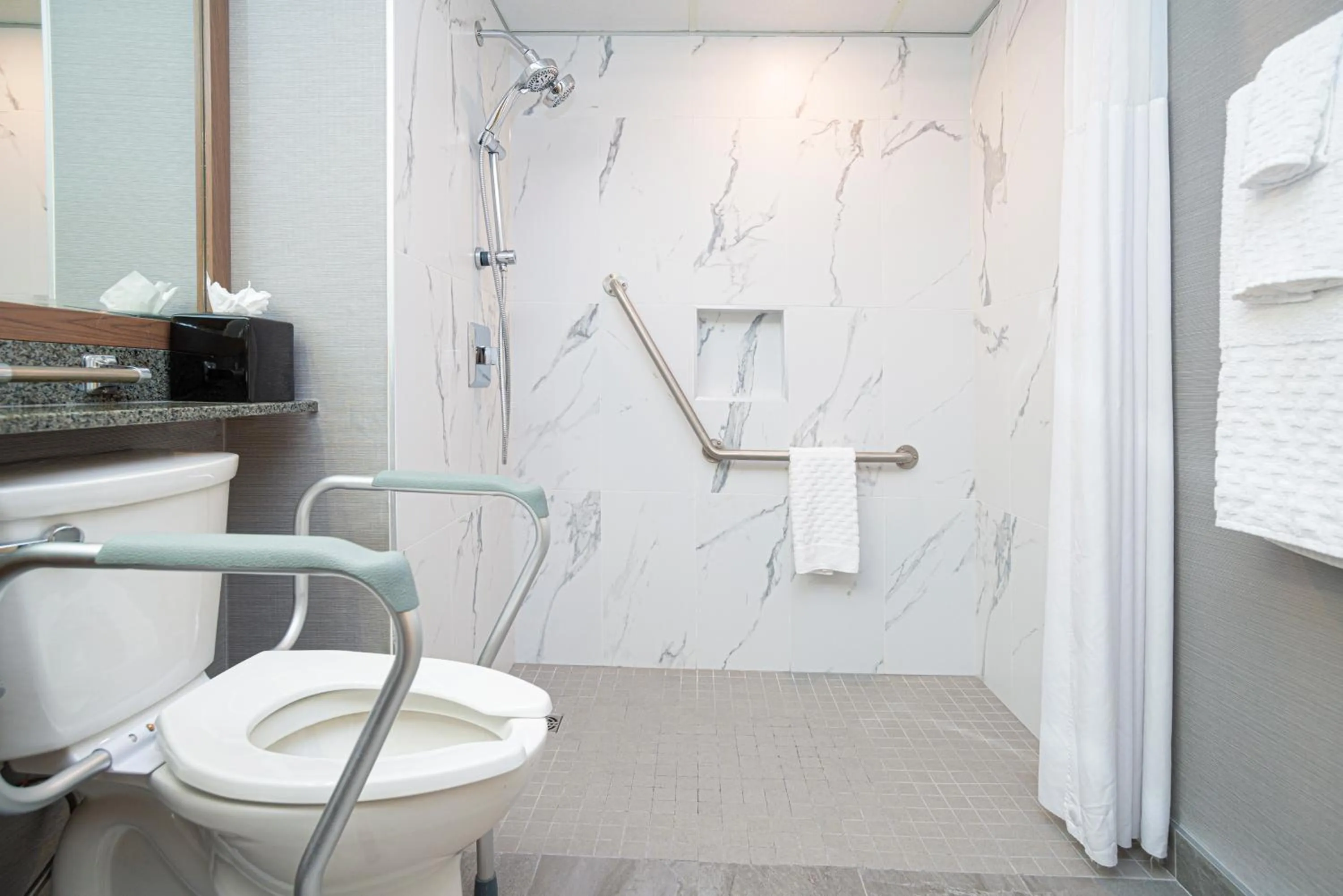 Toilet in Best Western Premier Chateau Granville Hotel & Suites & Conference Centre