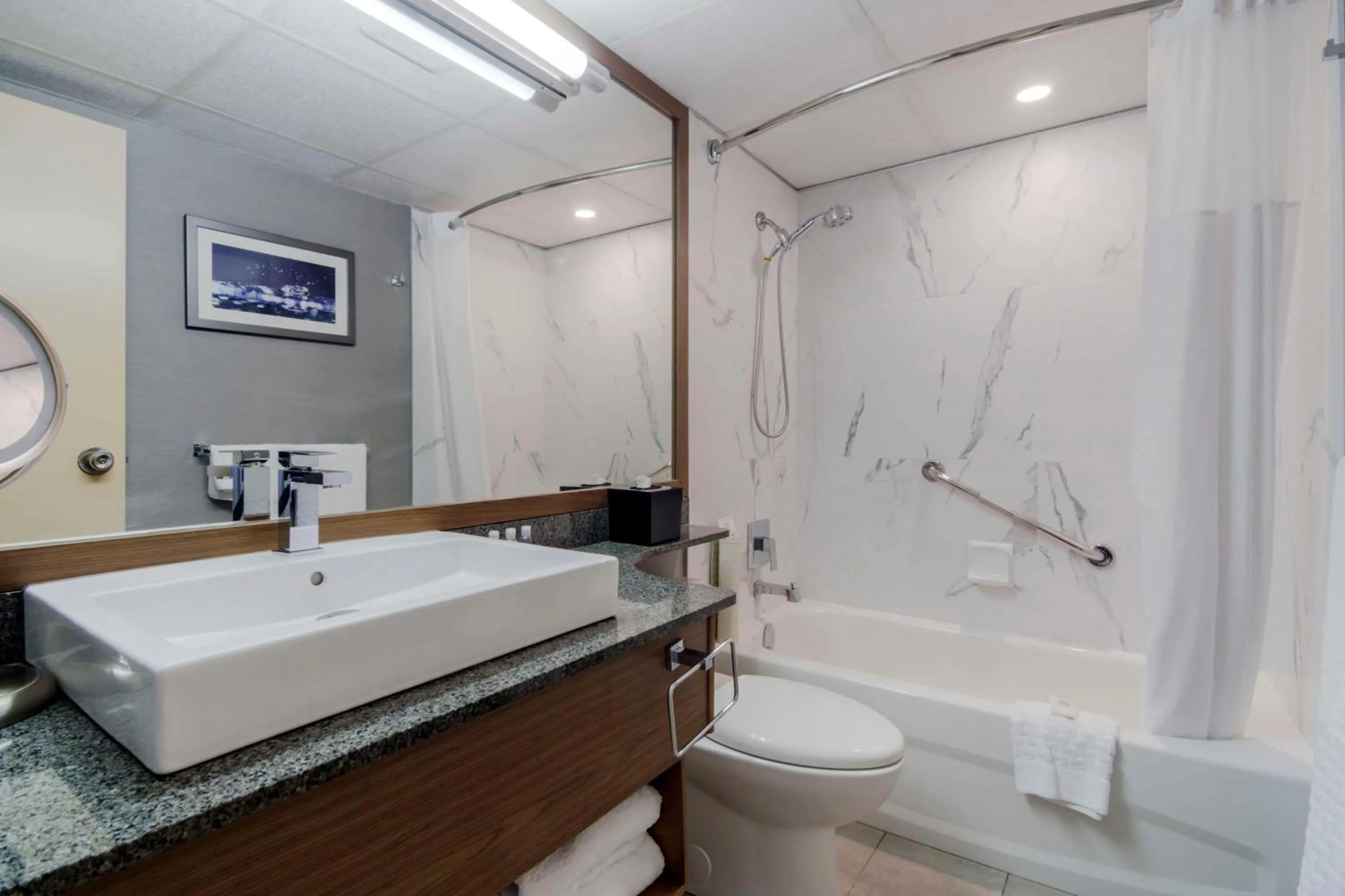 Toilet in Best Western Premier Chateau Granville Hotel & Suites & Conference Centre