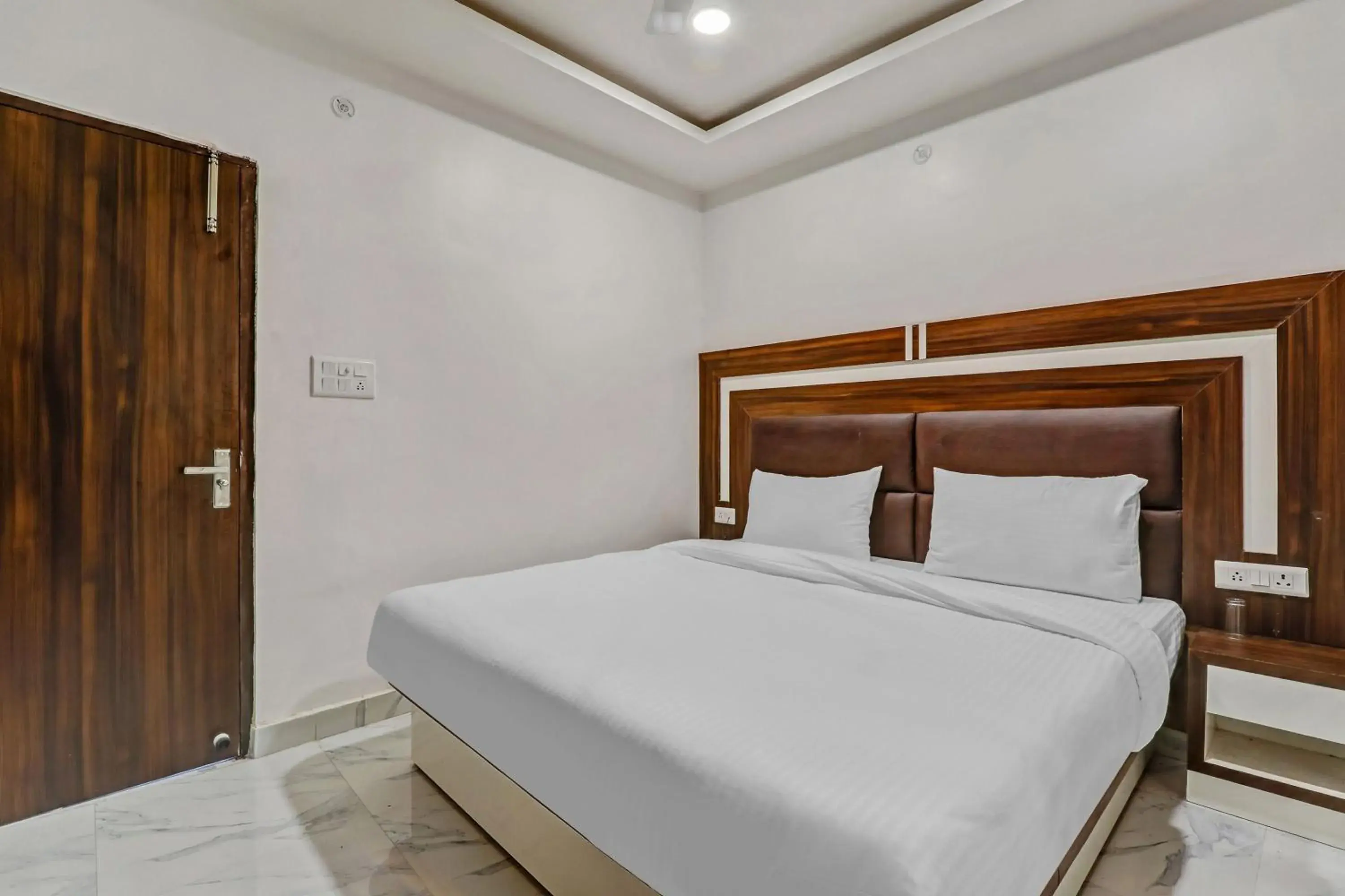 Bedroom, Bed in Super Collection O Yamuna Palace Near Gomti Riverfront Park Bedroom, Bed in Super Collection O Yamuna Palace Near Gomti Riverfront Park